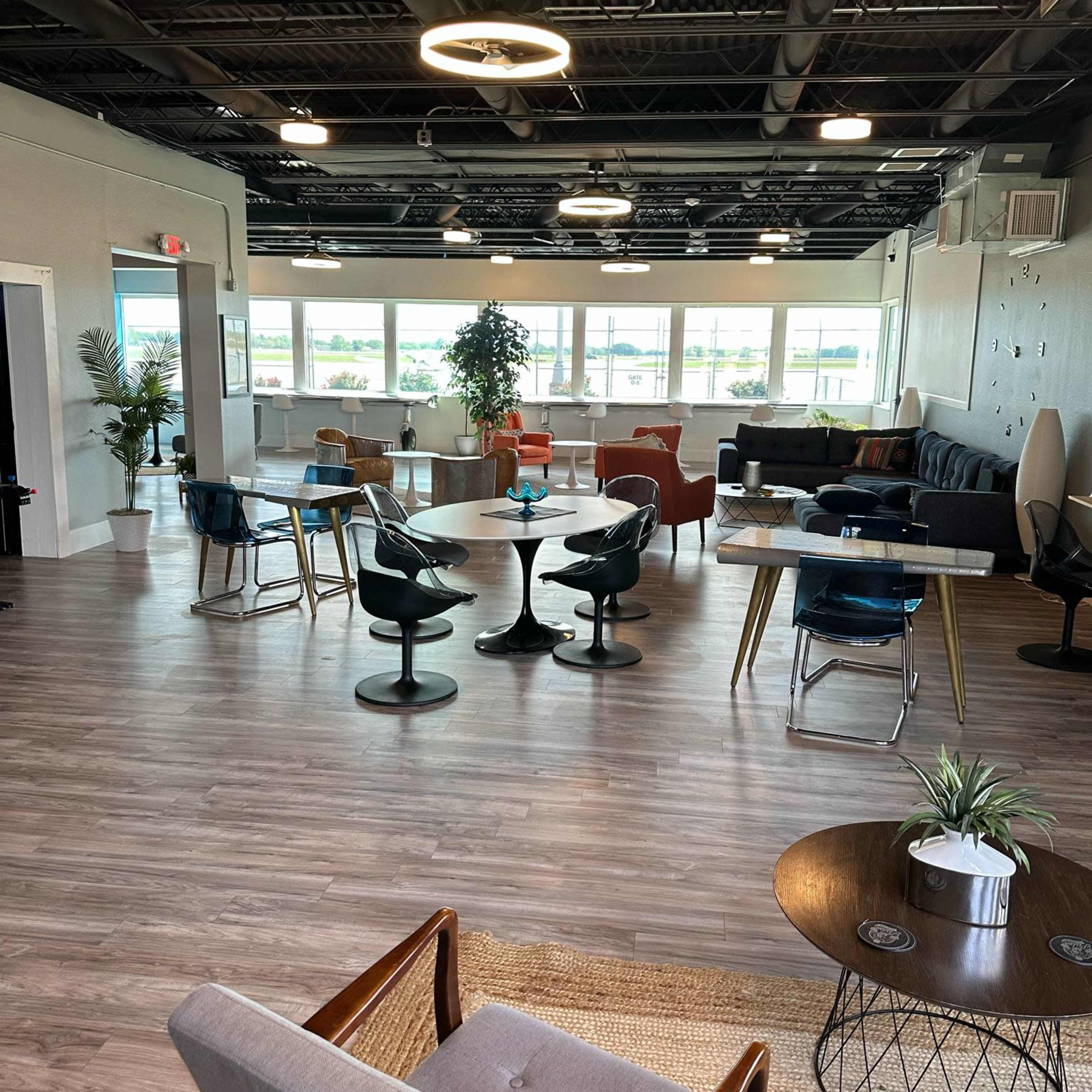 Modern Aviation Lounge with Runway Views + Retro Arcade Vibe Image in East Alton, East Alton, IL