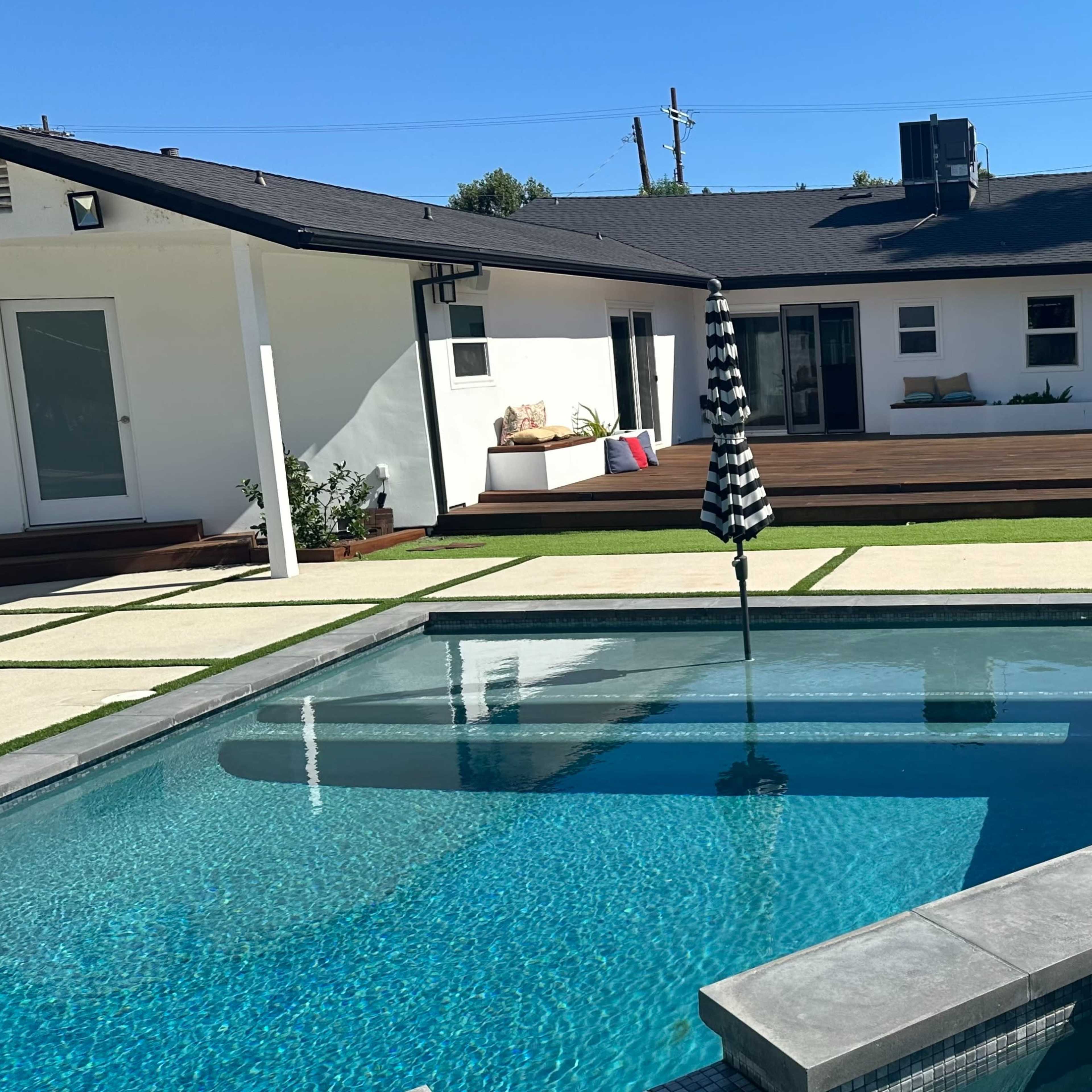 Modern Backyard Oasis with Pool & Outdoor Kitchen Image in Woodland Hills, Los Angeles, CA