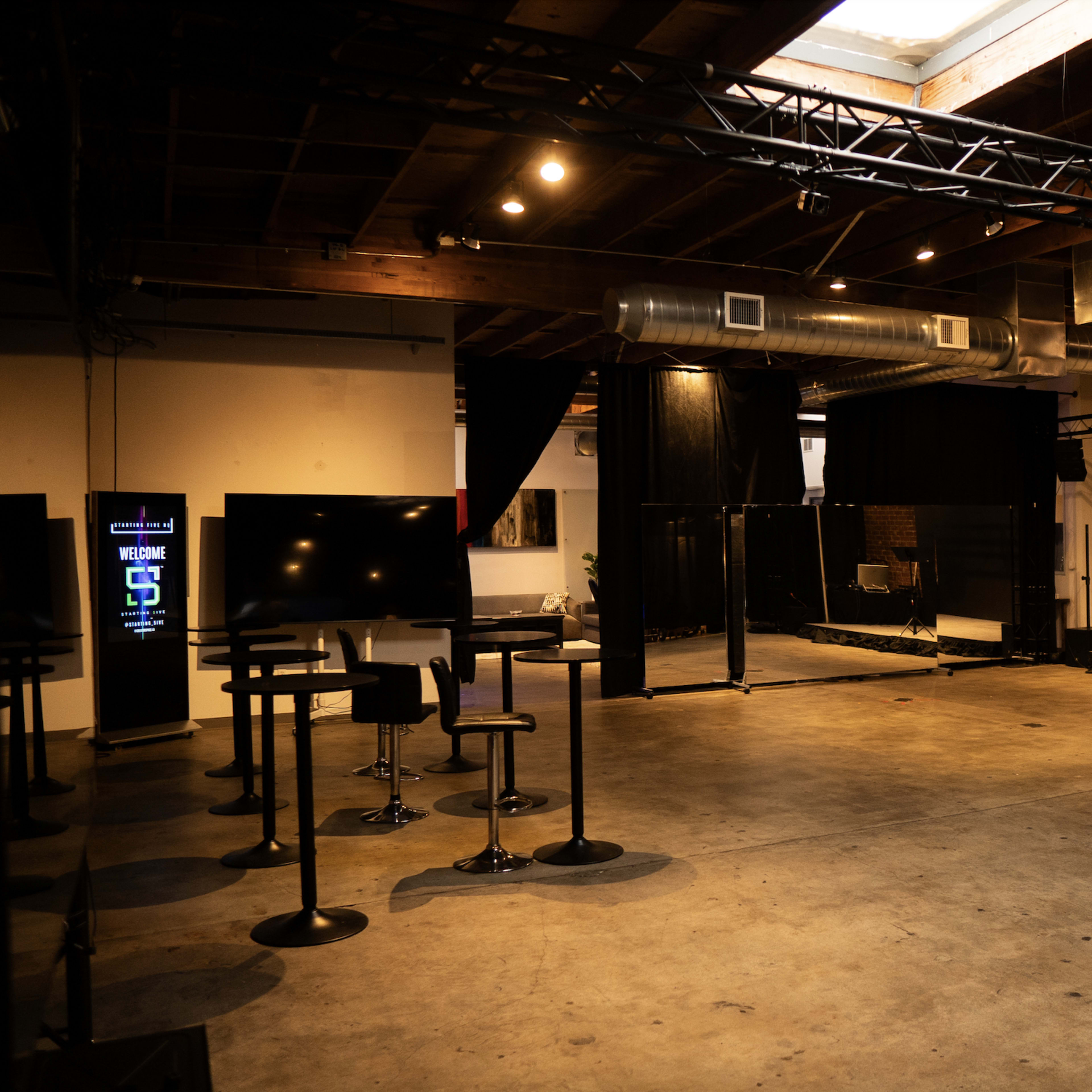 Unique & Spacious Flex Space with Stage | Sound System | Multiple Rooms | Red Carpet | Podcast Studio Image in Mid-City, Santa Monica, CA
