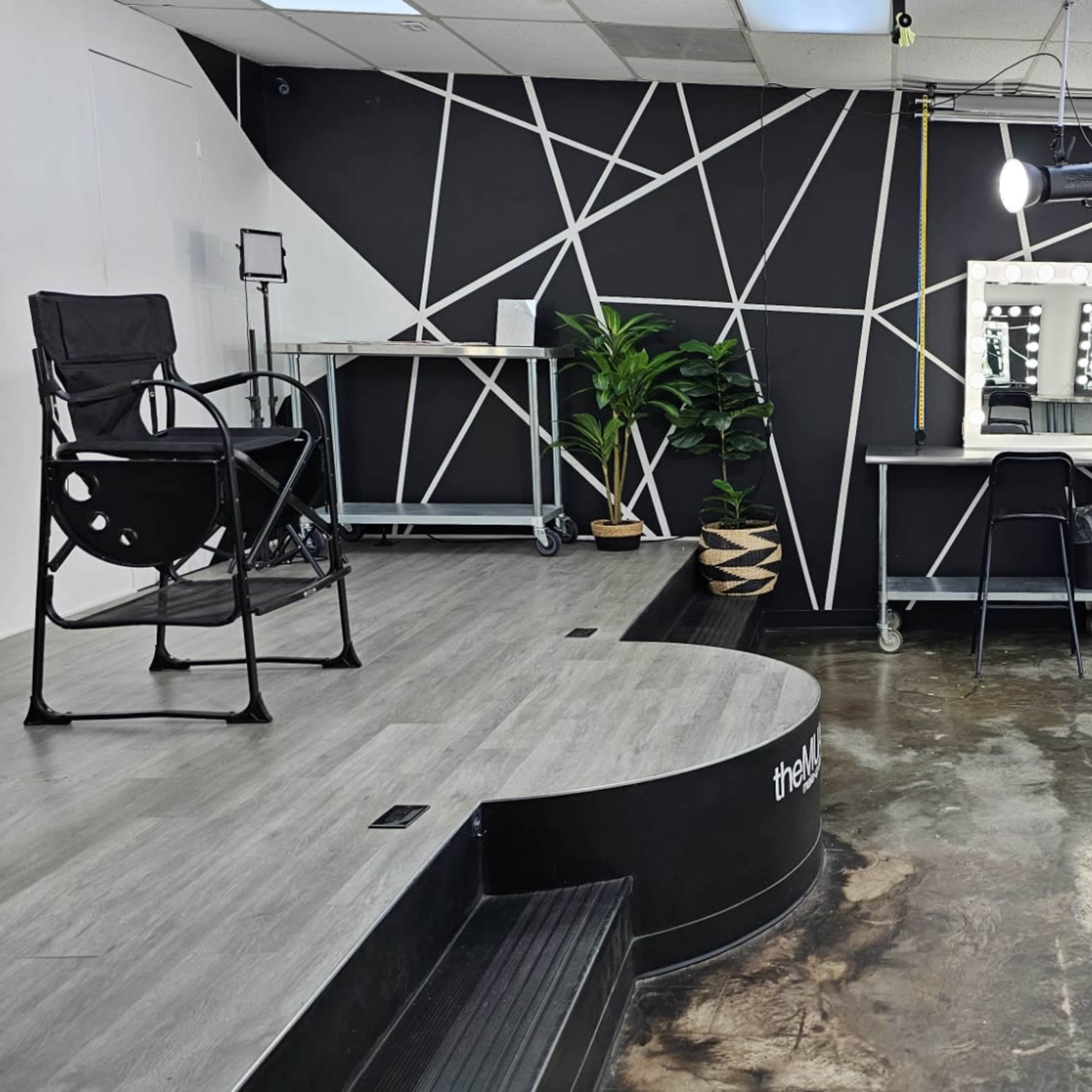 Clean, bright, open studio or classroom with Hollywood Vanities and barstool chairs Image in Westside, Houston, TX
