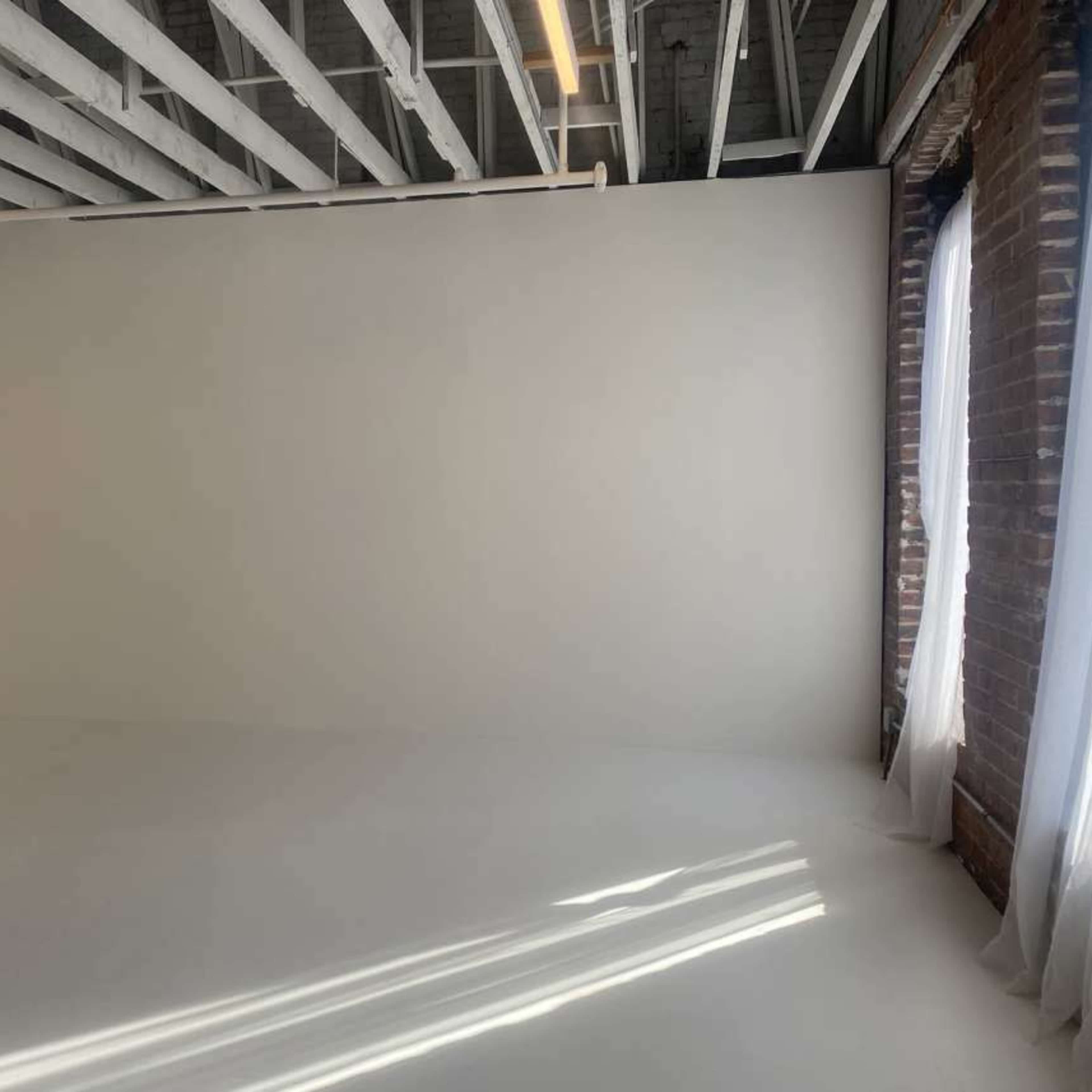 Downtown Photo Studio with Infinity Wall Image in Downtown, Omaha, NE