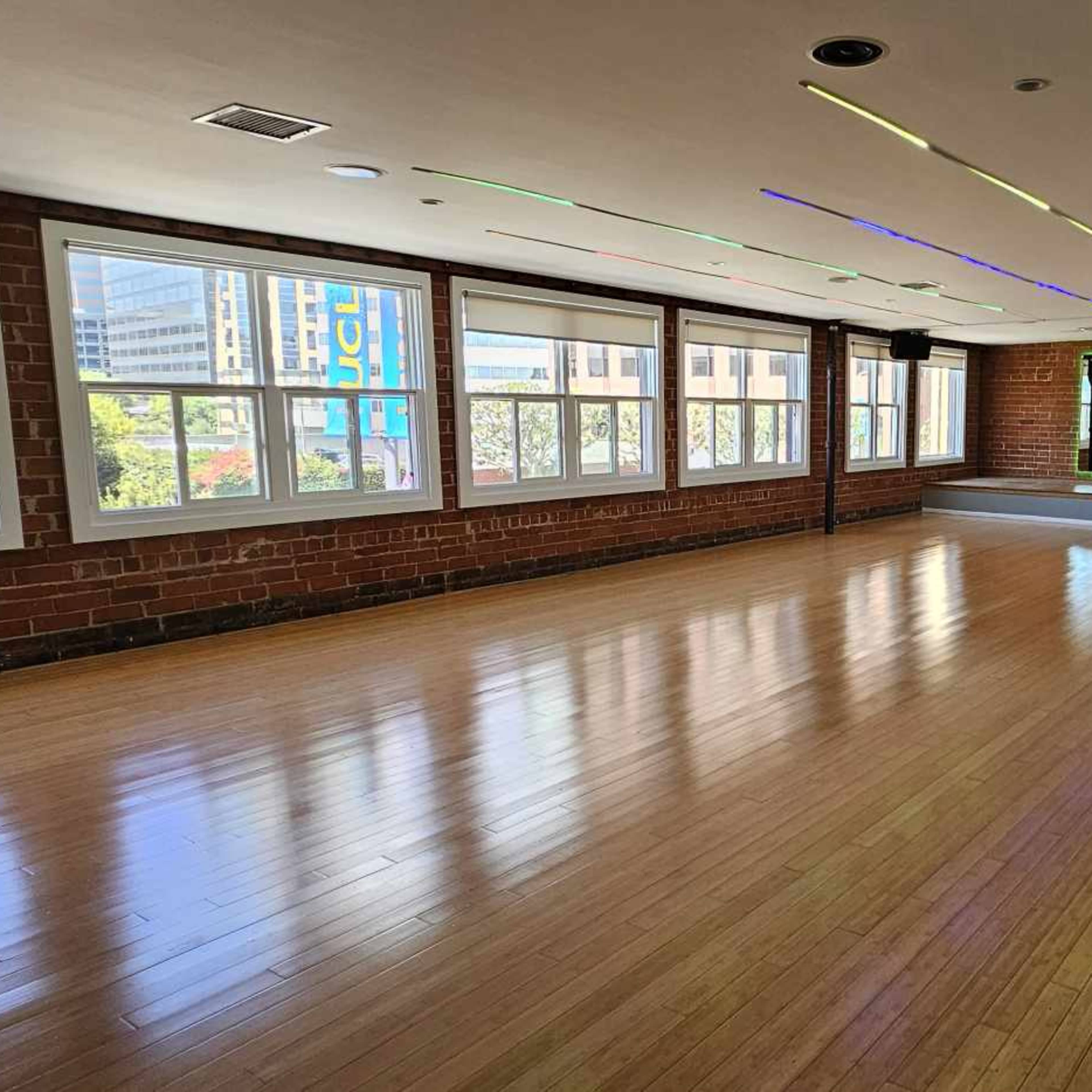 New Dance Studio with red brick walls giving a New York vibe Image in Westwood, Los Angeles, CA
