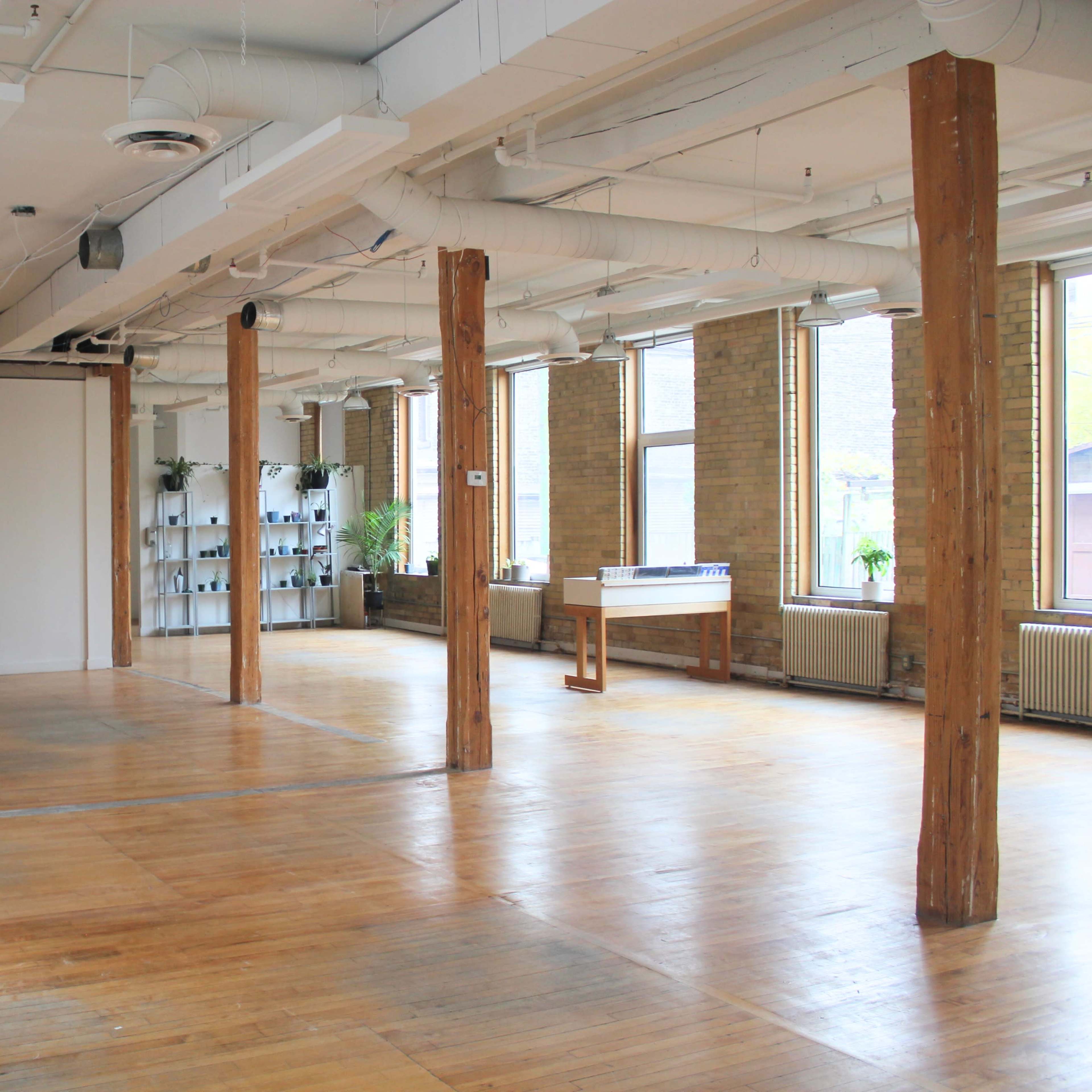 Downtown Loft with Natural Light, Brick, and Exposed Wooden Beams Image in Downtown Toronto, Toronto, ON