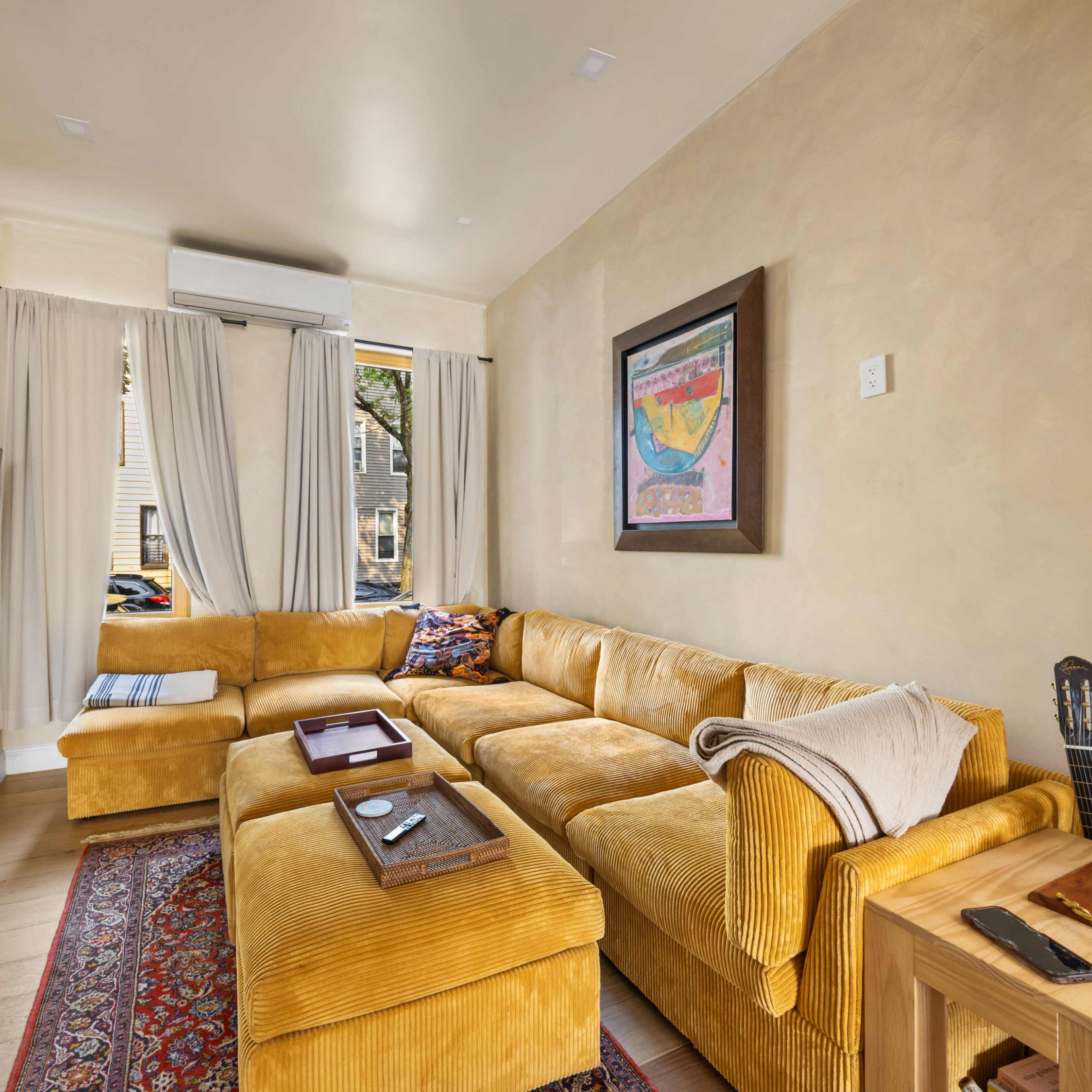 Mediterranean Townhouse with Chic Backyard Image in Ridgewood, Queens County, NY