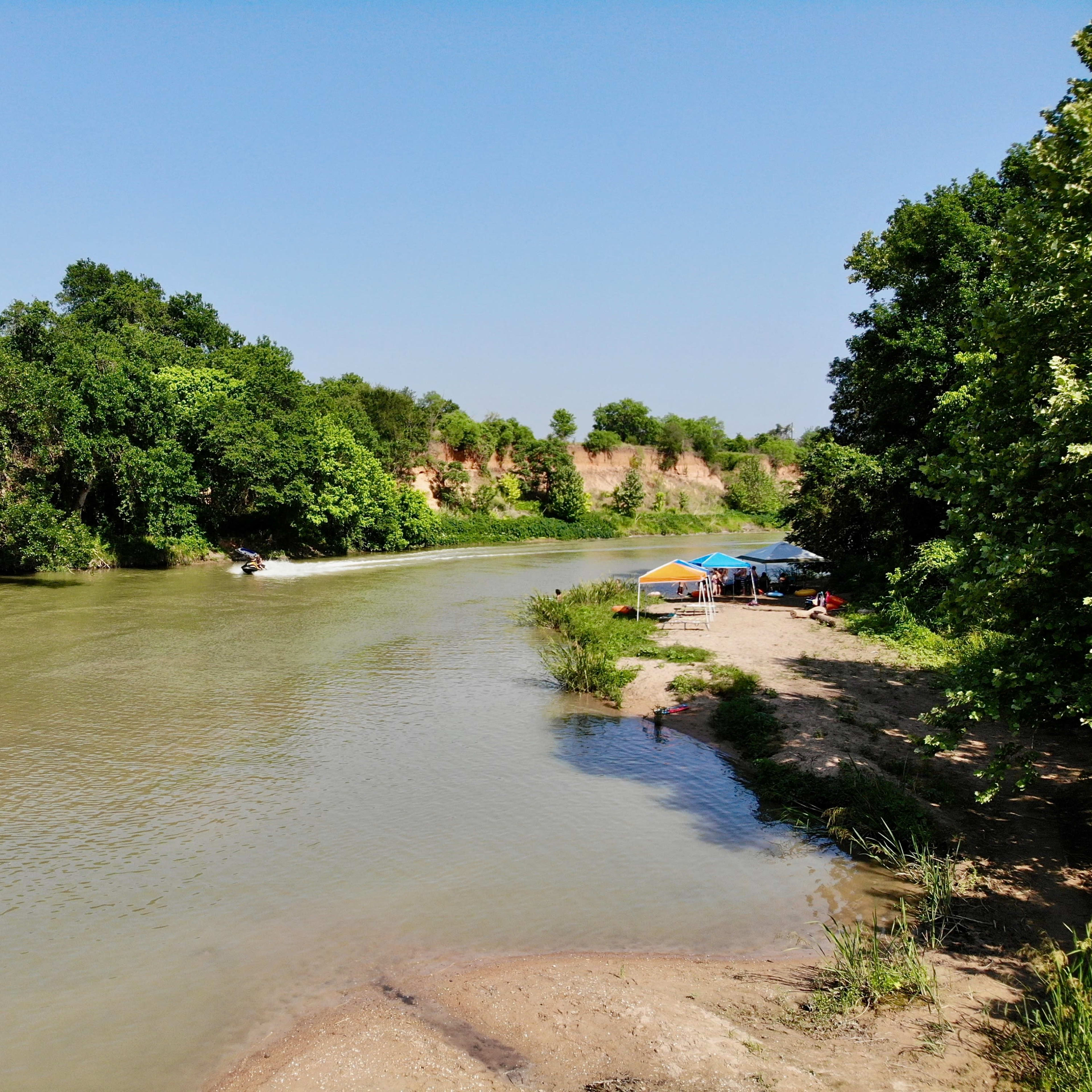 Lush Campground on the River just Outside of Austin. Image in River Timber, Del Valle, TX