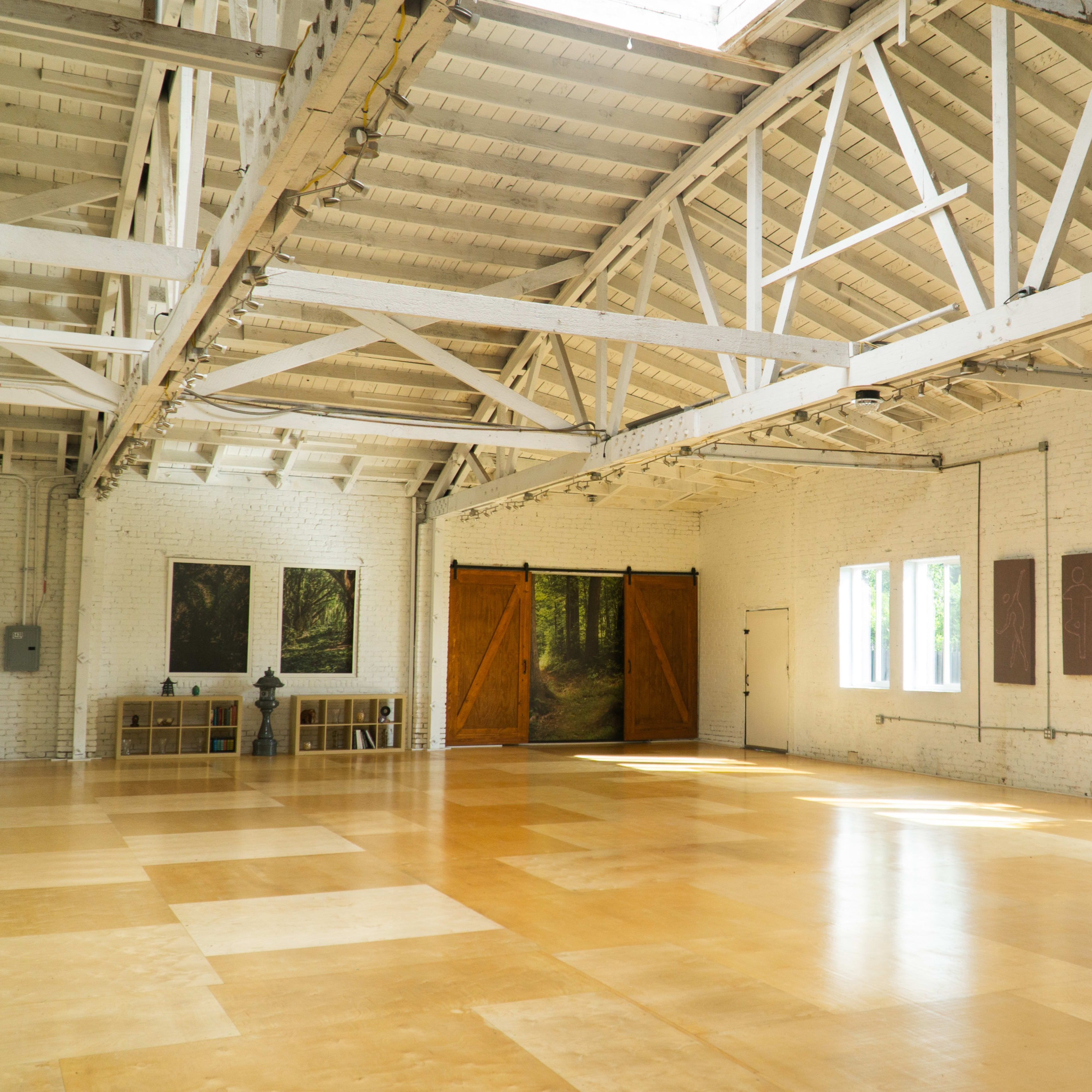 Warehouse Studio with Brick Walls, Wood Floors and Front Stage Image in South Los Angeles, Los Angeles, CA