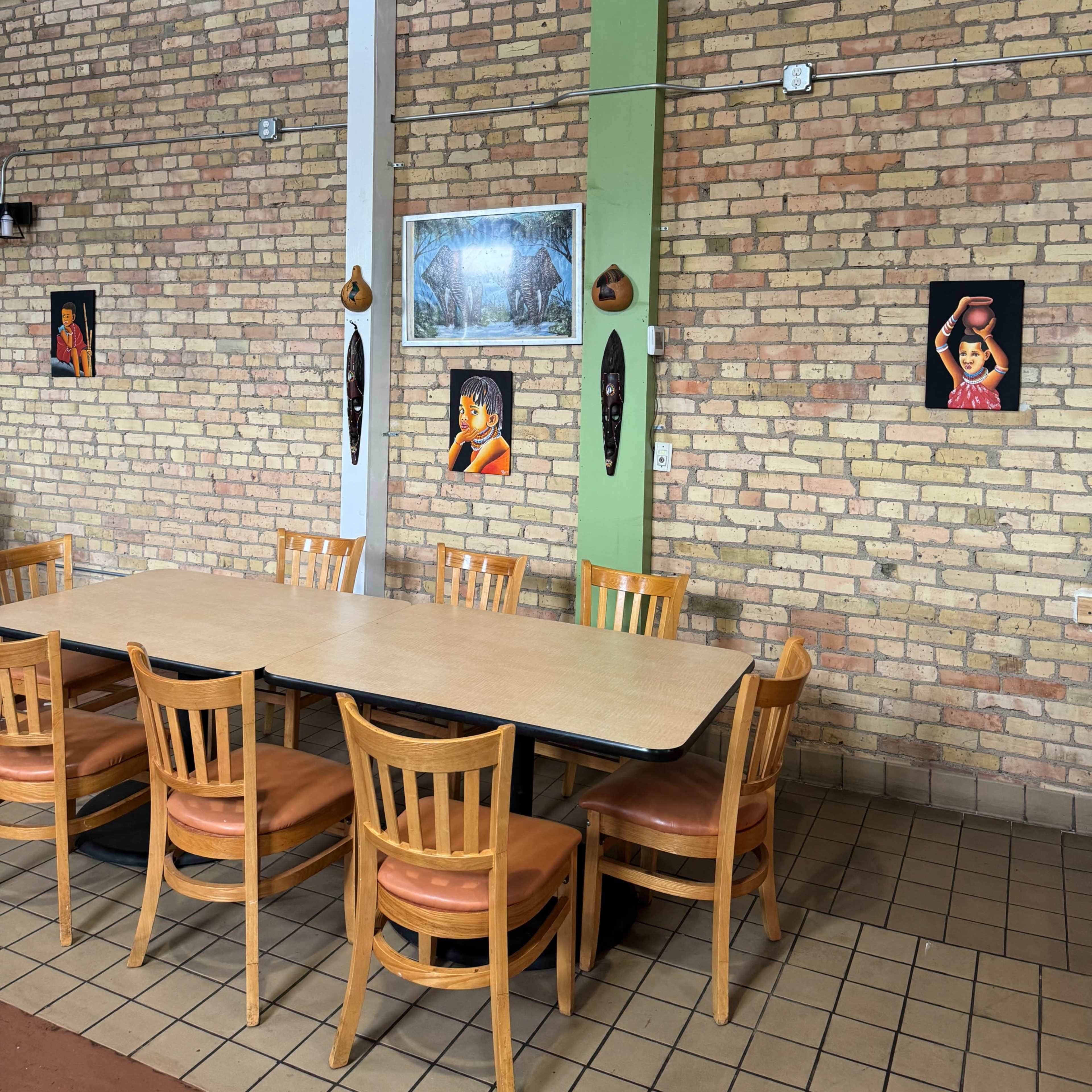 Turn-of-the-century brick building with a commercial kitchen and dining area. Image in Cedar-Riverside, Minneapolis, MN