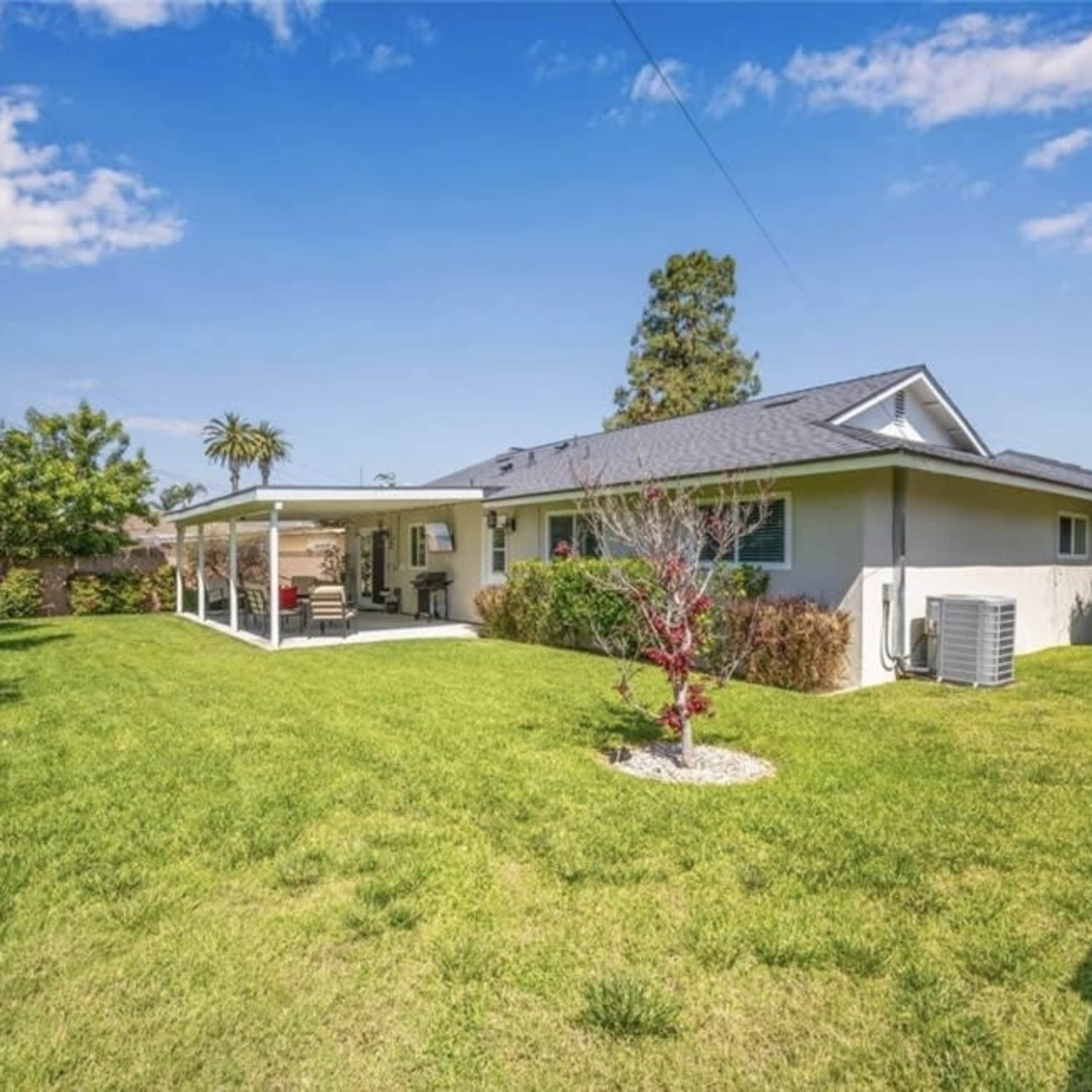 Spacious Charming Backyard with Patio Lights and Firepit Image in Garden Grove, Garden Grove, CA