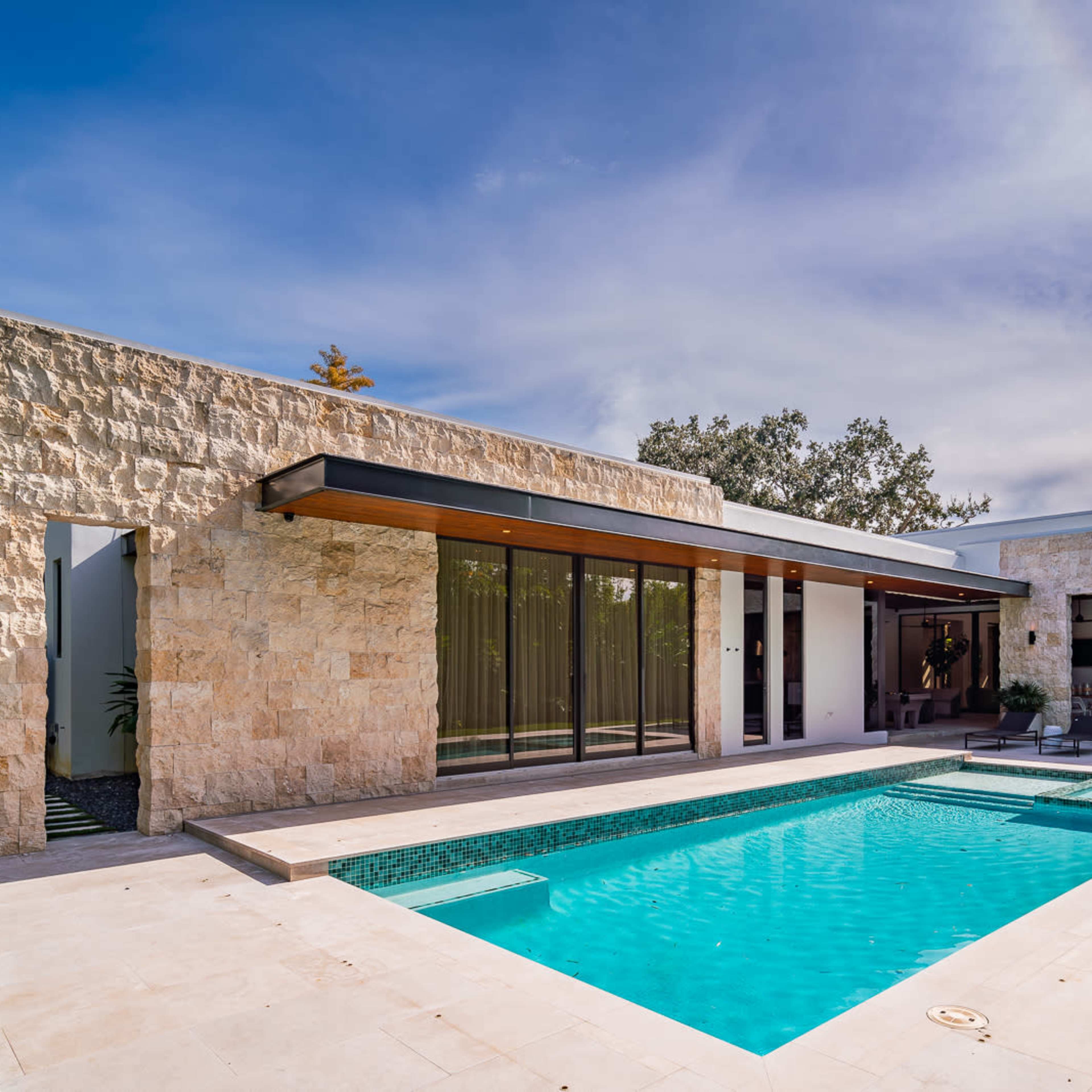 Earthy Tropical Modern Outdoor Oasis with Pool, Hammocks, Kitchen, BBQ, Jacuzzi, Pool Table and more Image in Glenvar Heights, Miami, FL