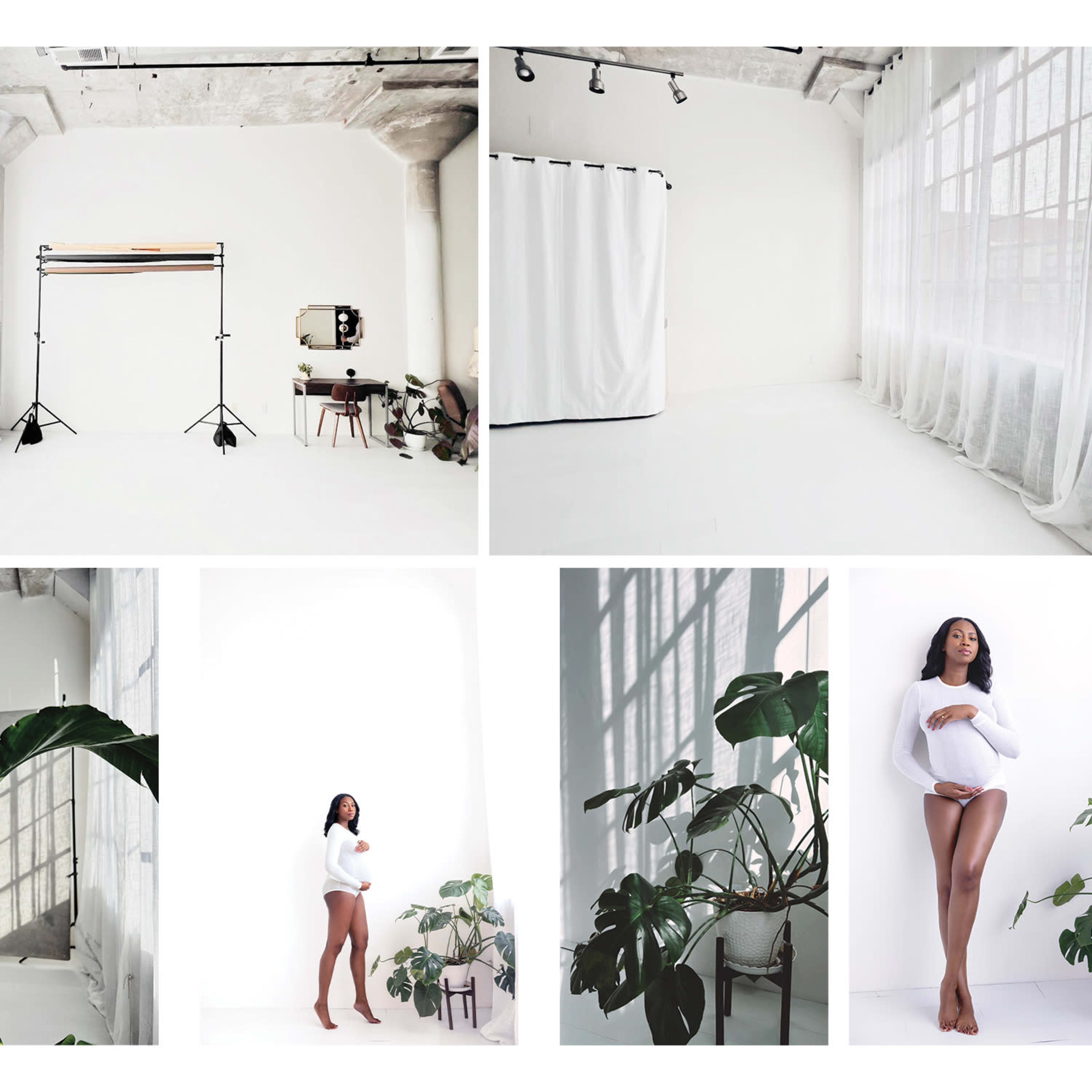 A bright, minimalistic studio space features a pregnant woman posing against a white backdrop, surrounded by large green plants.