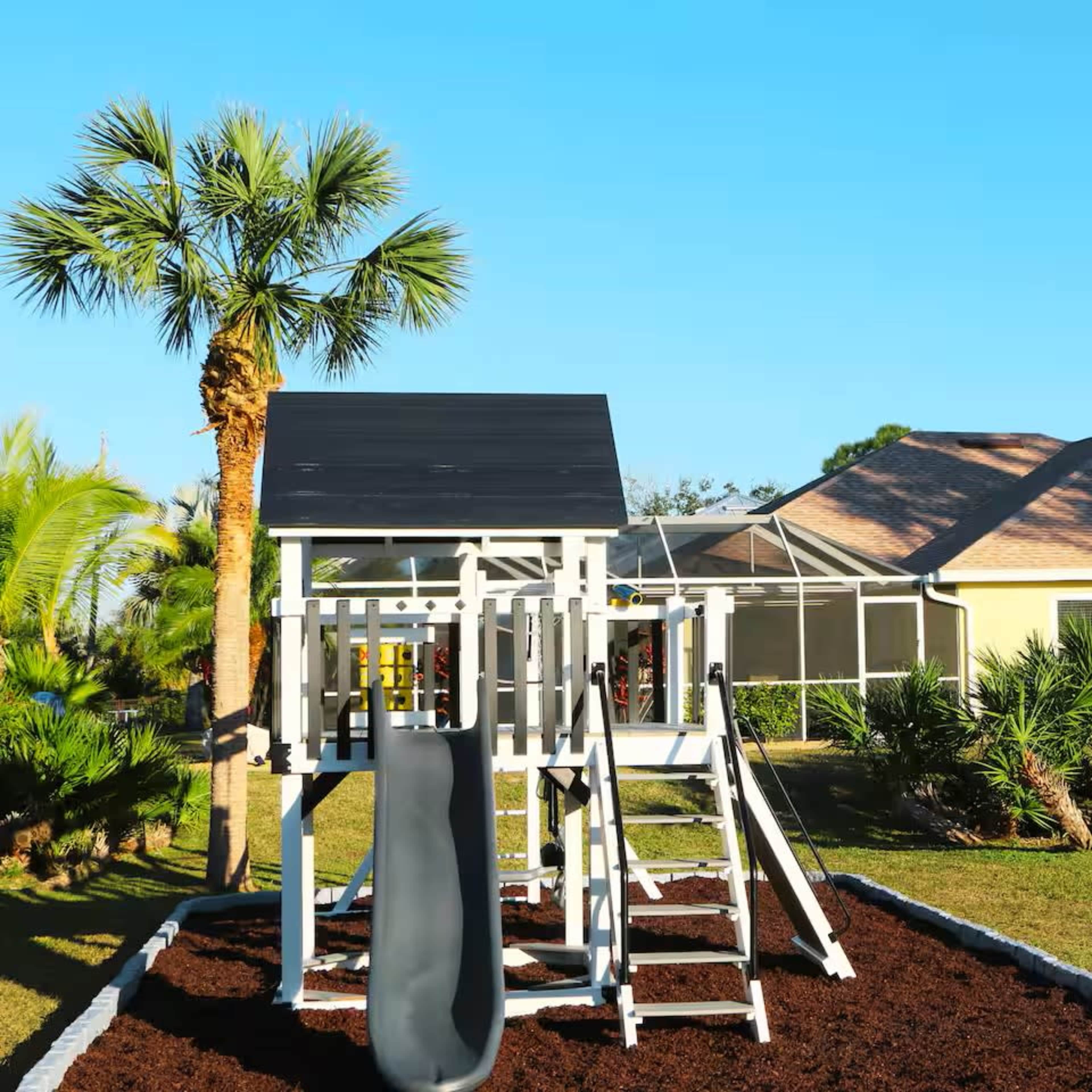 Quaint Florida casita on a double lot with a heated saltwater pool, massive playground, surrounded by Mother nature! Image in Englewood East, Port Charlotte, FL