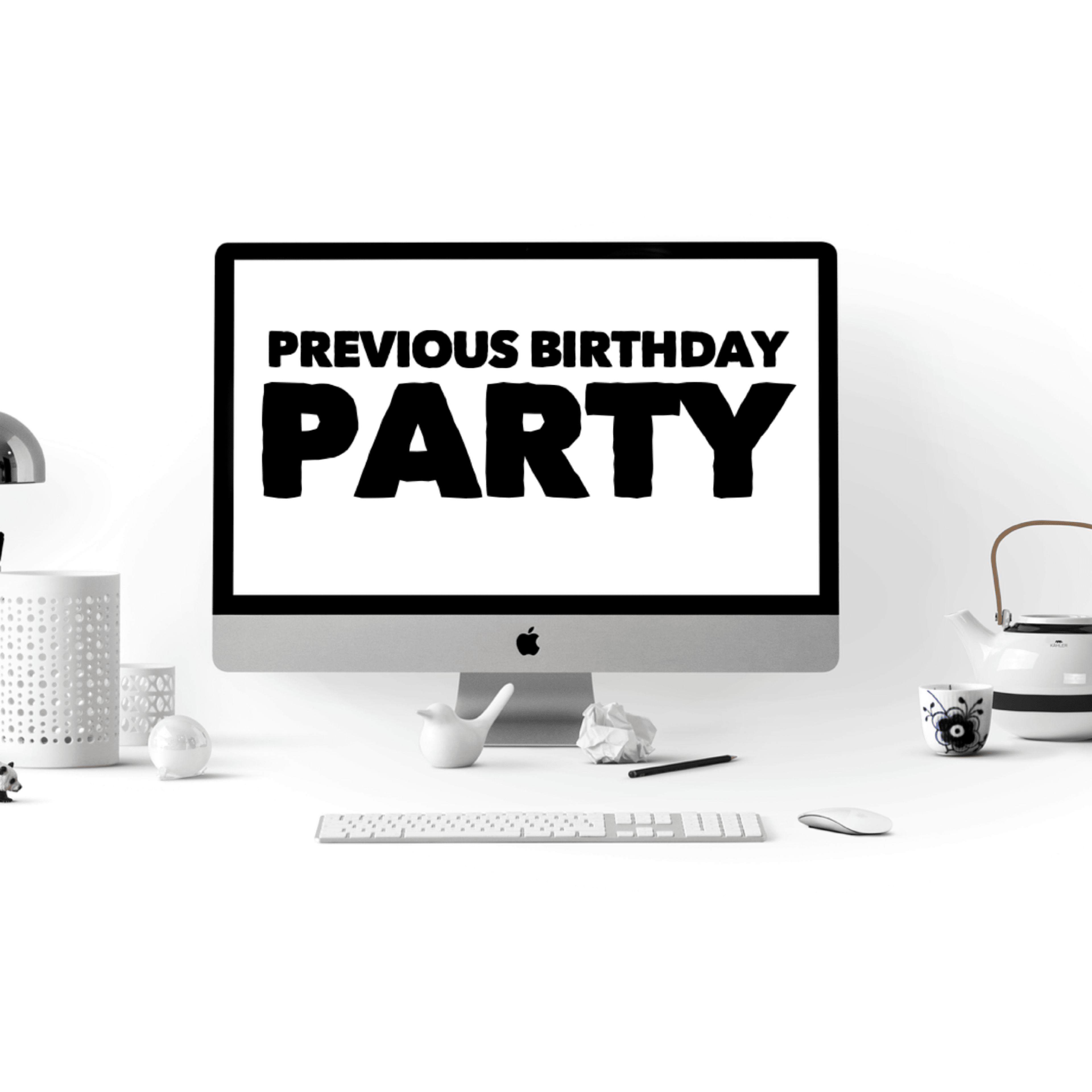 A computer monitor on a desk displays the words "PREVIOUS BIRTHDAY PARTY" in bold letters.