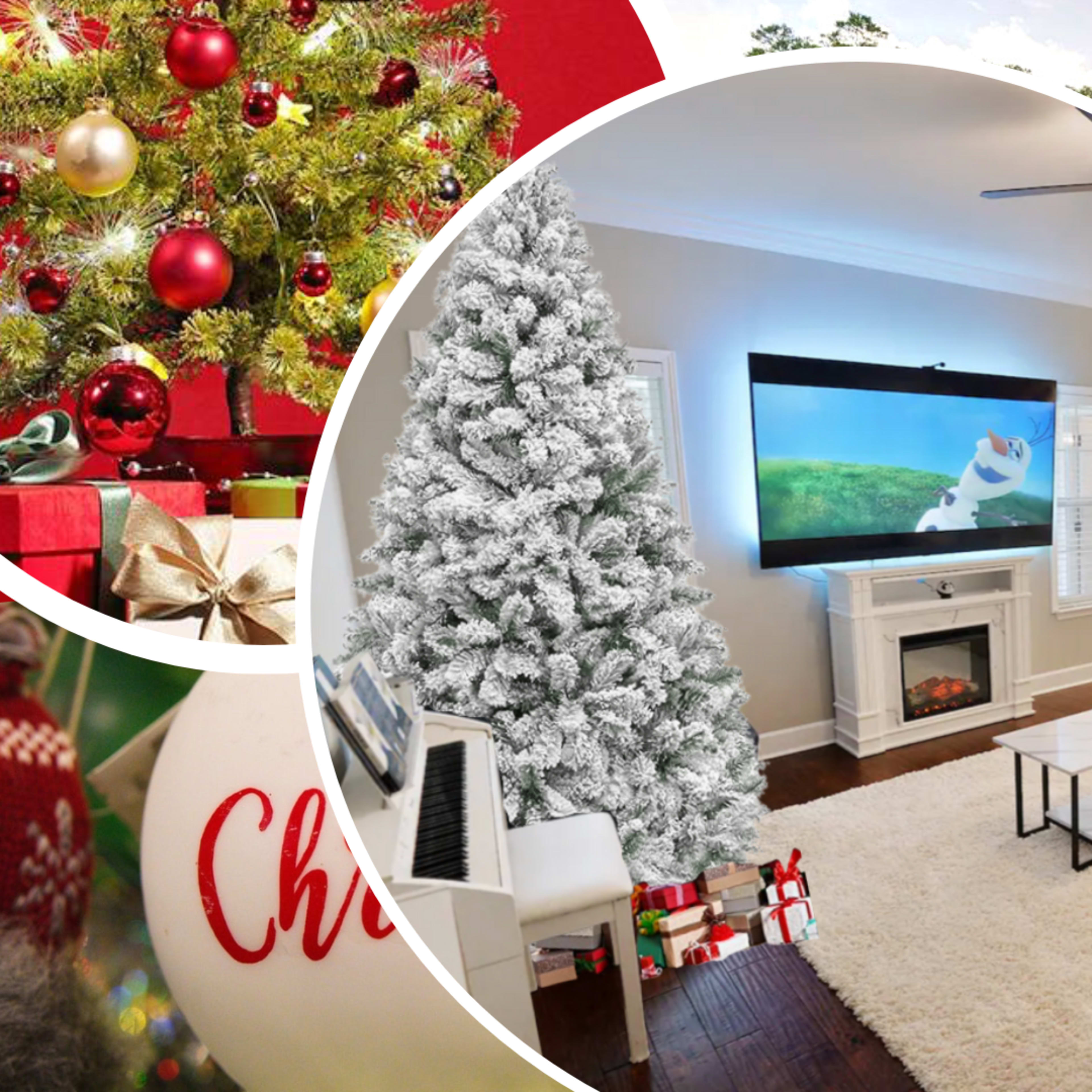 A cozy living room decorated for Christmas, with a white tree, festive ornaments, and a television displaying a snowy scene.