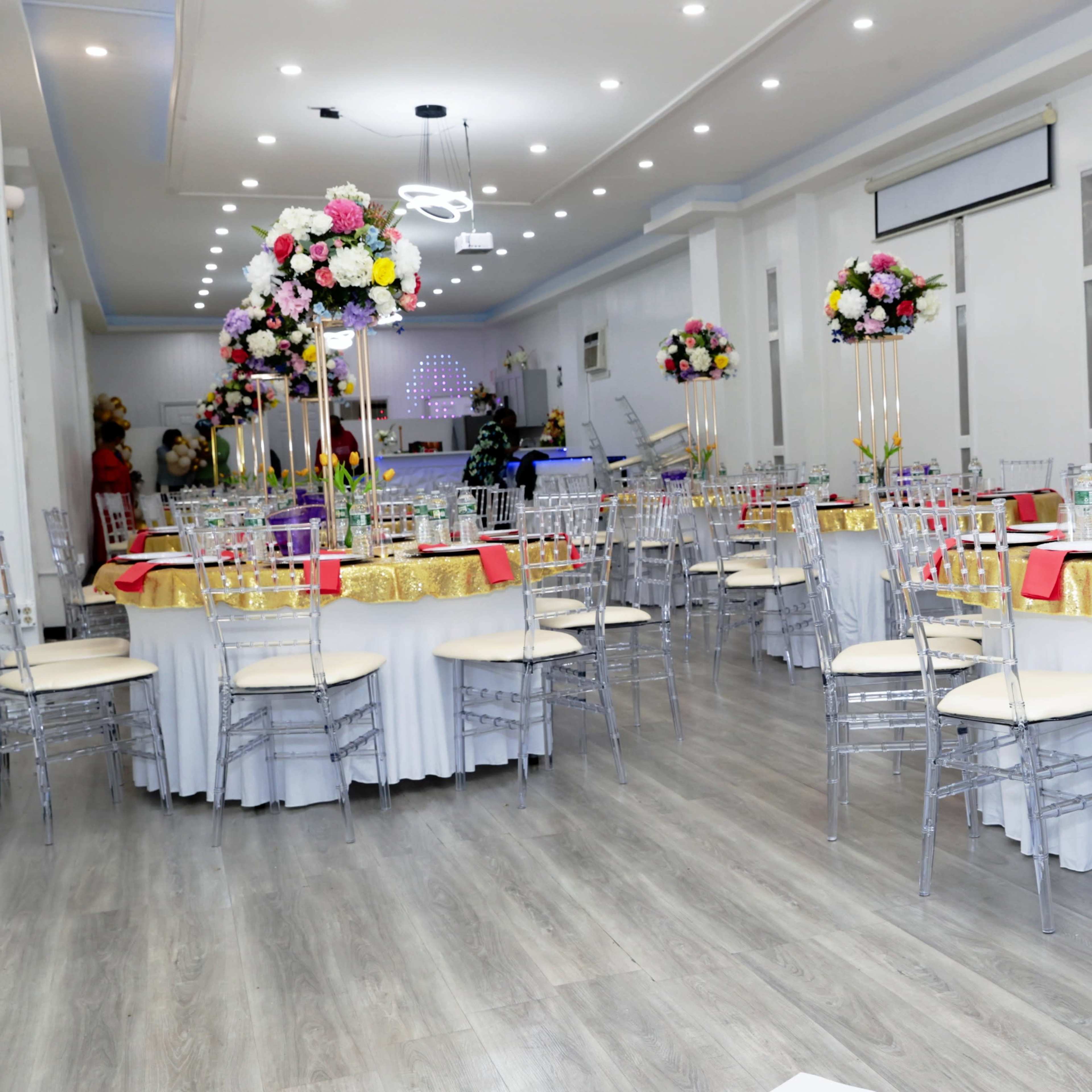 An all white  sAtunning Premier Event Venue with Accent and Flower Walls. Image in Jamaica, Queens County, NY