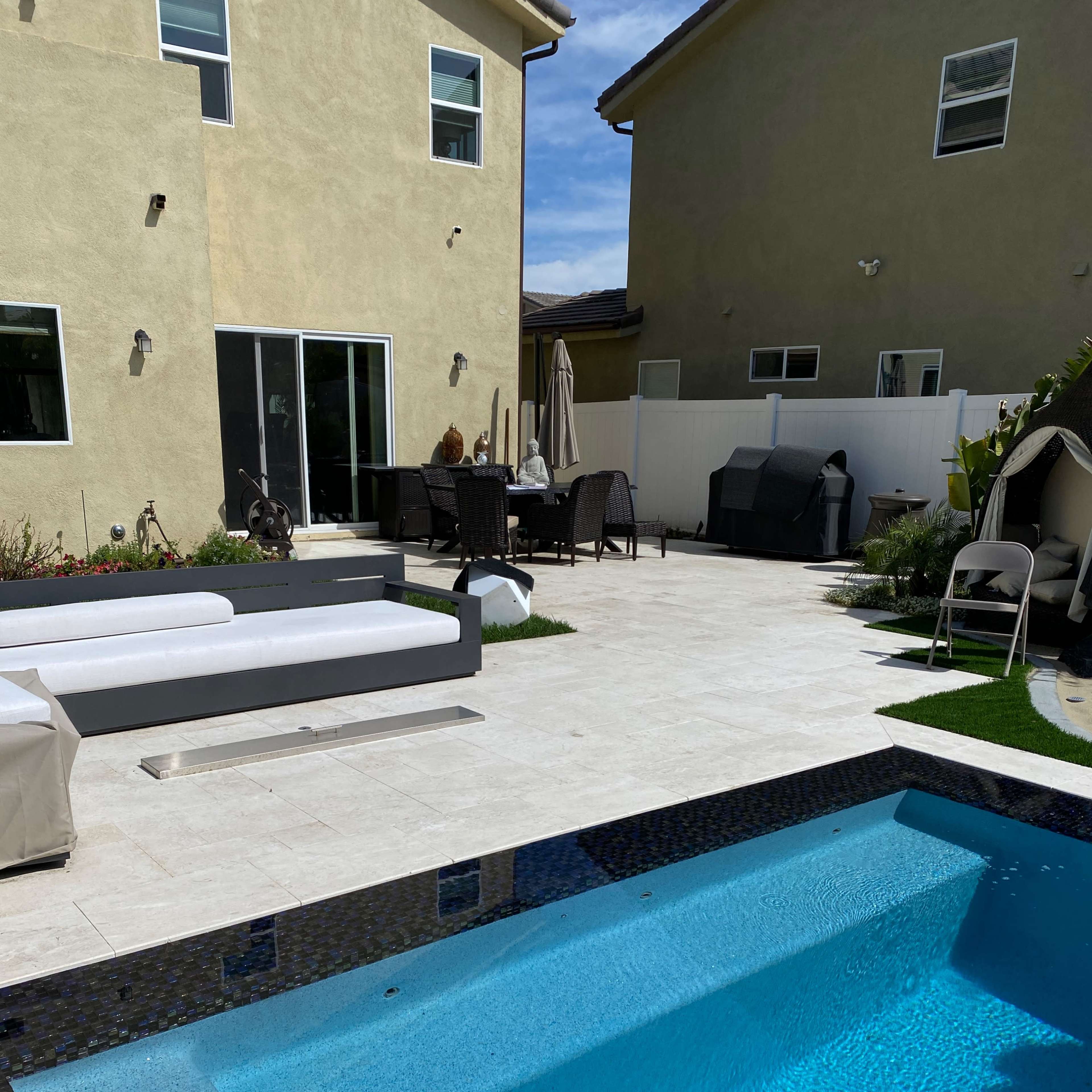 Lovely Hawaiian feel backyard with a 10x12 heated spa Image in North Hills, Los Angeles, CA