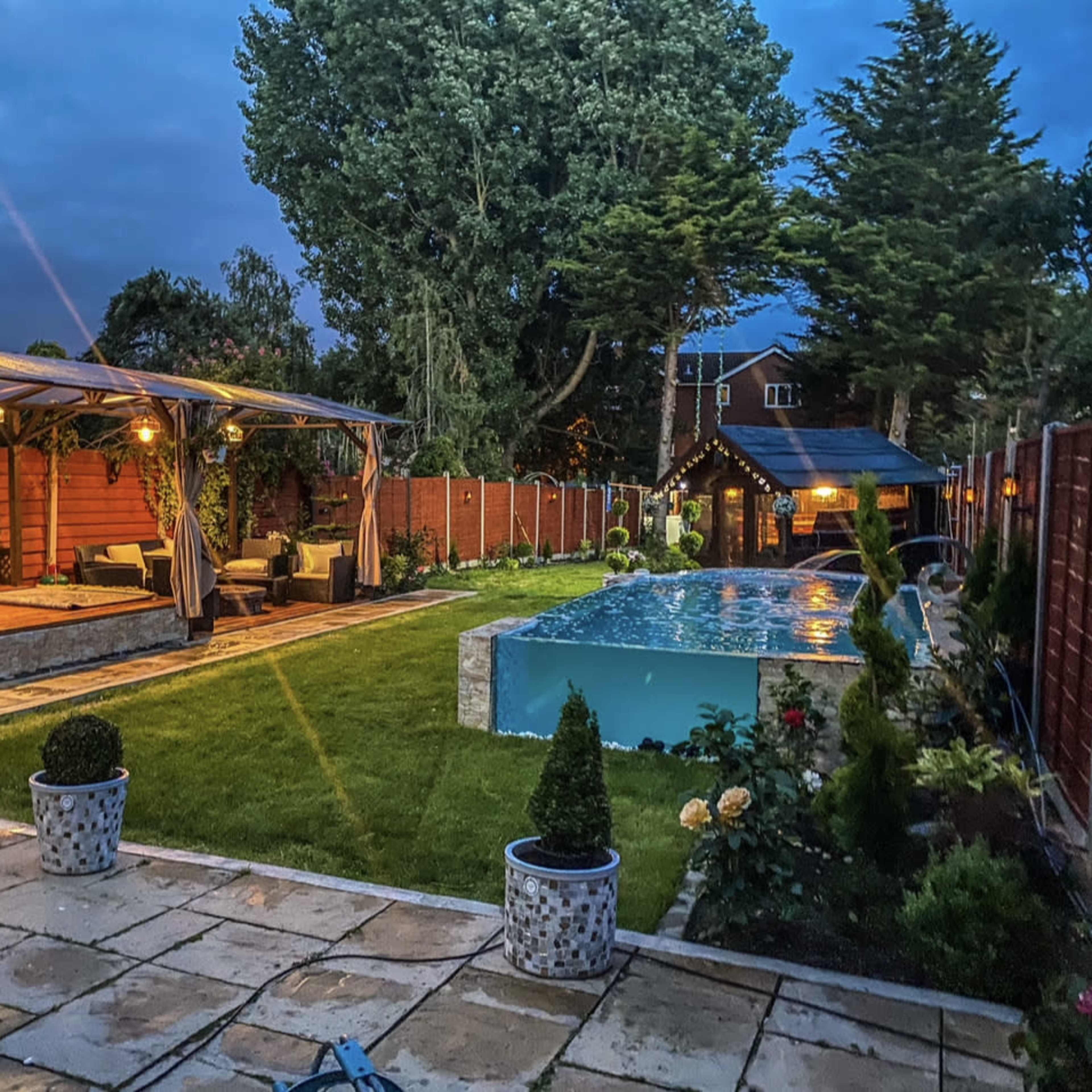 Luxe Glass-Pool House Image in Church End & Roundwood, London, England