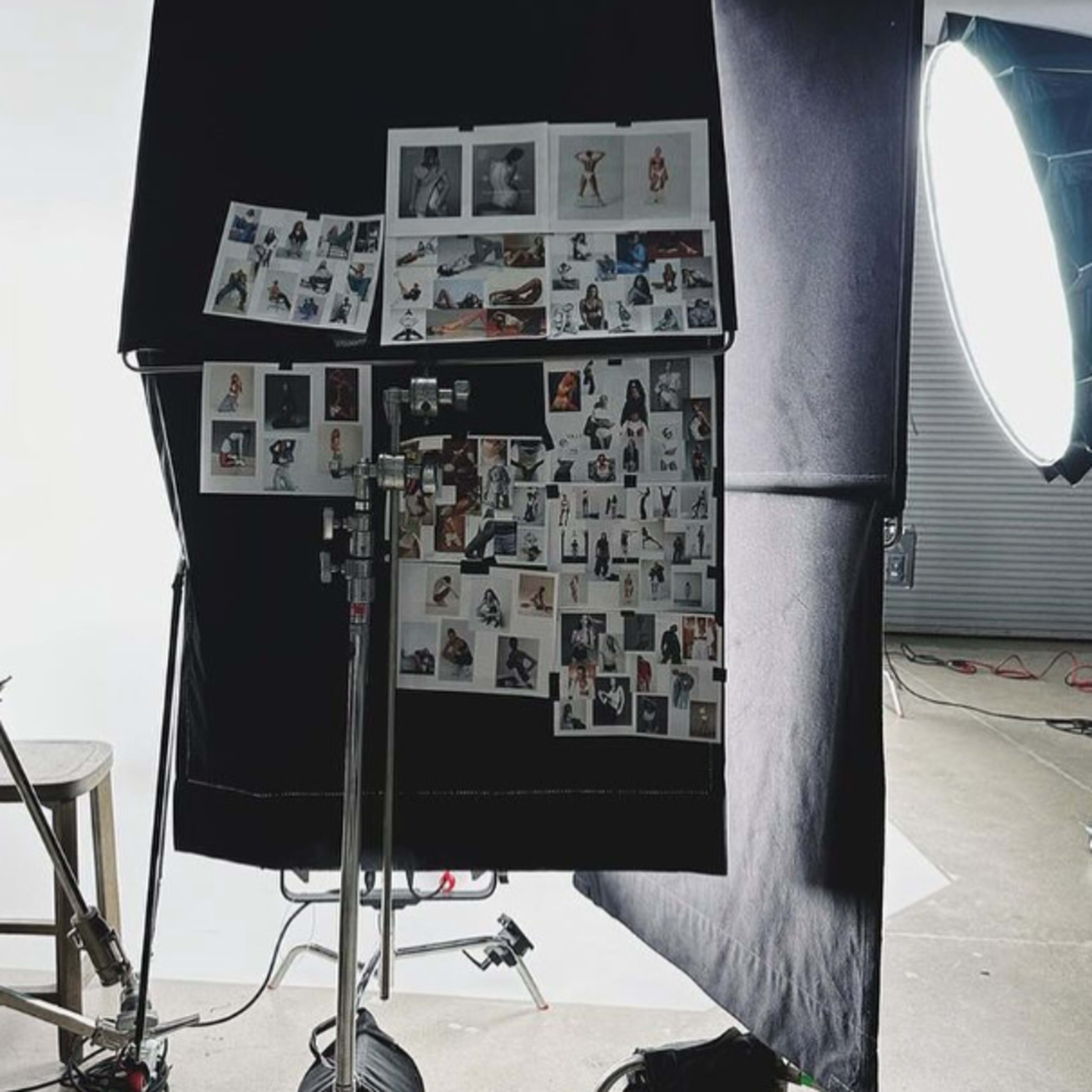 A photography backdrop setup is shown with mood boards and a large light source in a studio environment.
