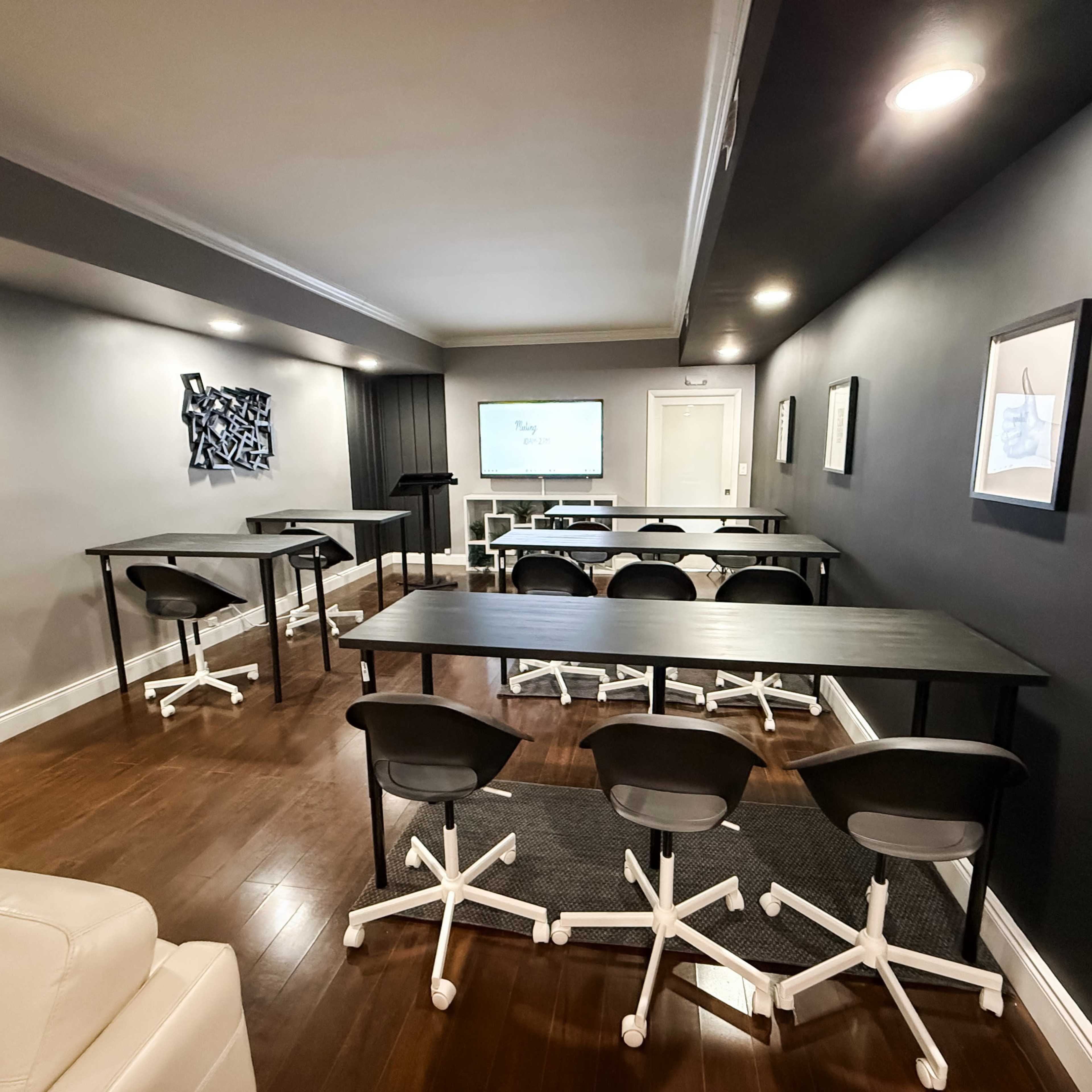 Training Room at Lauderdale-By-The-Sea w/ Smart Board Image in Knoll Ridge, Fort Lauderdale, FL