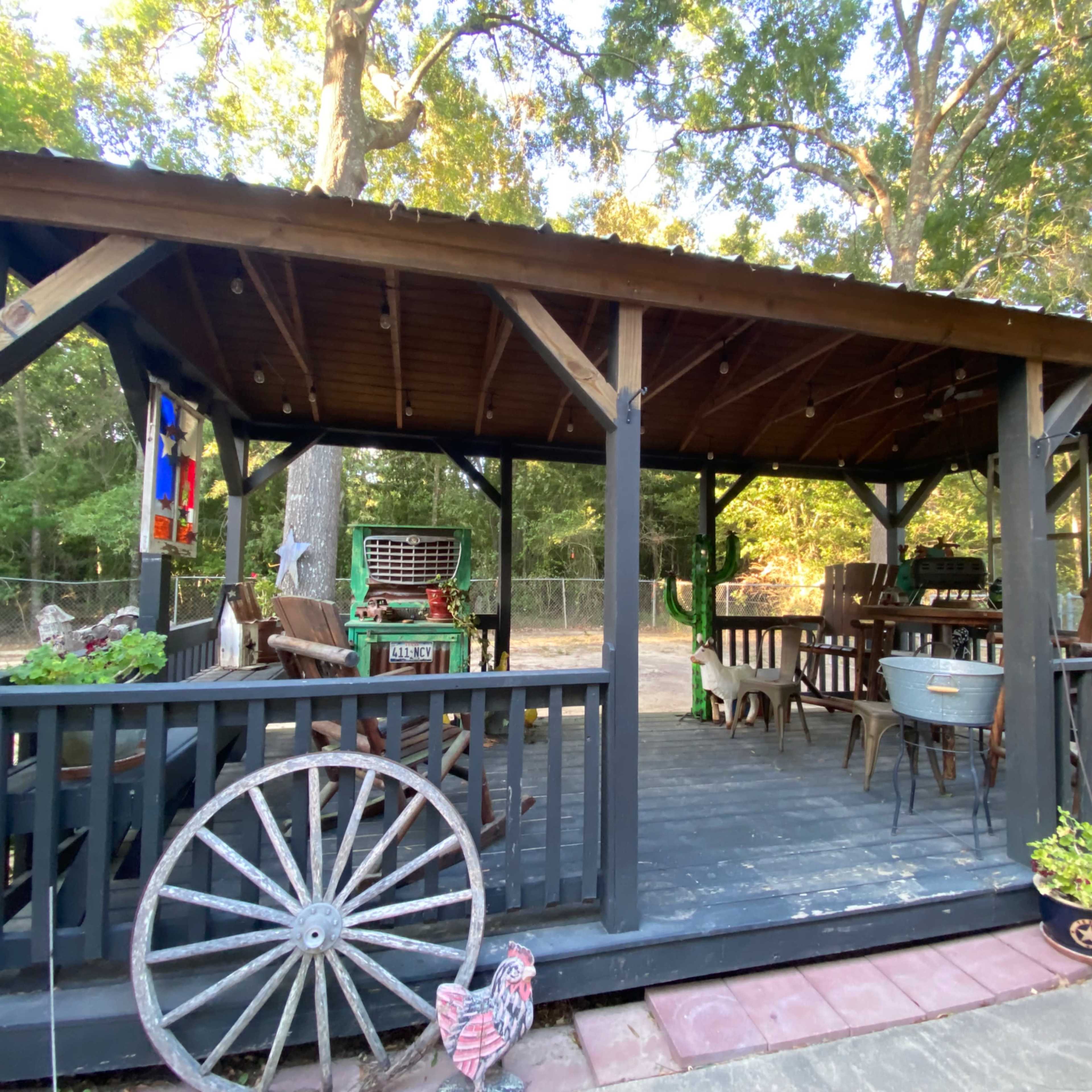 Lake area home with large gazebo and fenced backyard. Image in West Livingston, Livingston, TX