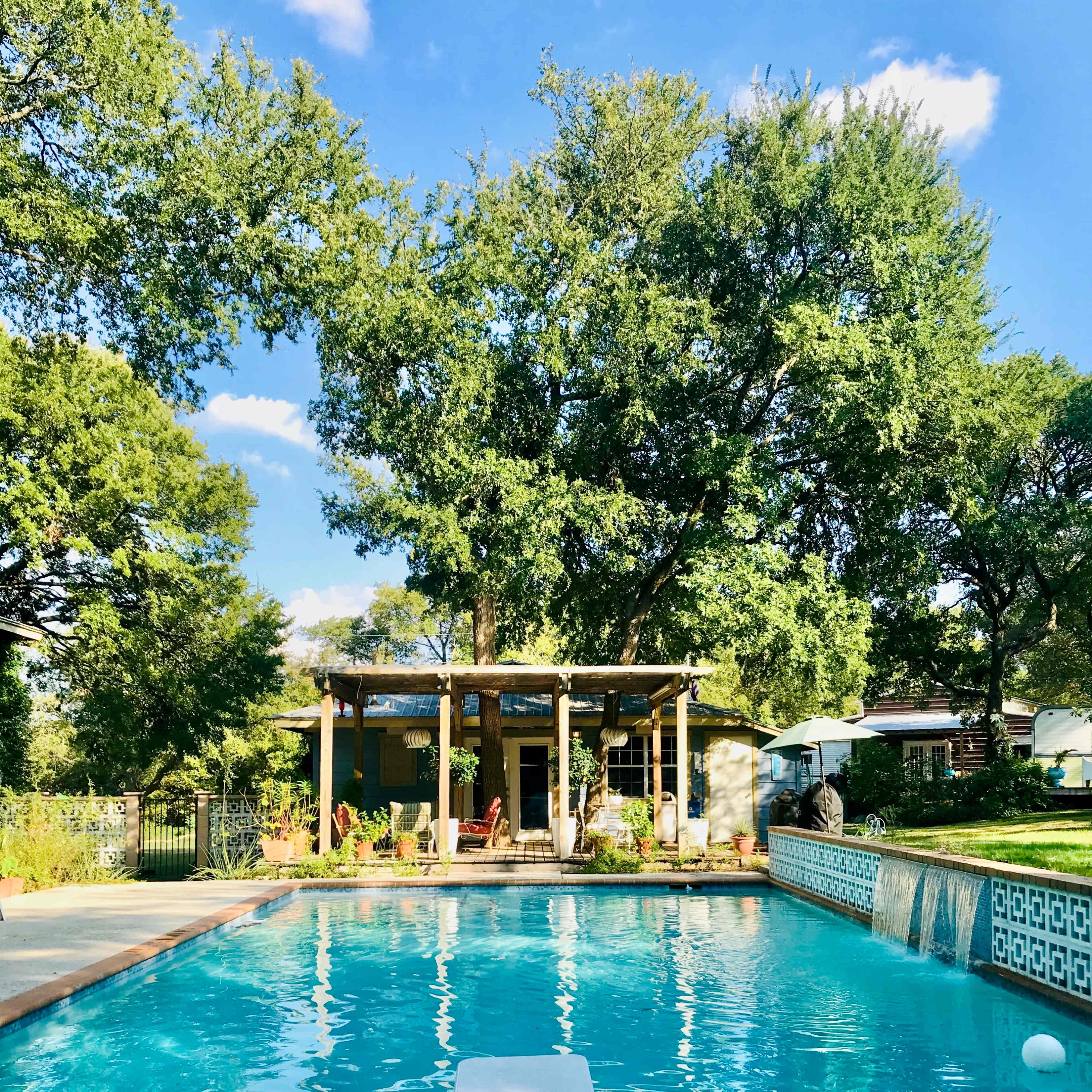 An Eclectic "Austin-tatious"  Large Retro Pool and Gameroom in a spacious private Southwest Austin country setting. Image in Oak Hill, Austin, TX