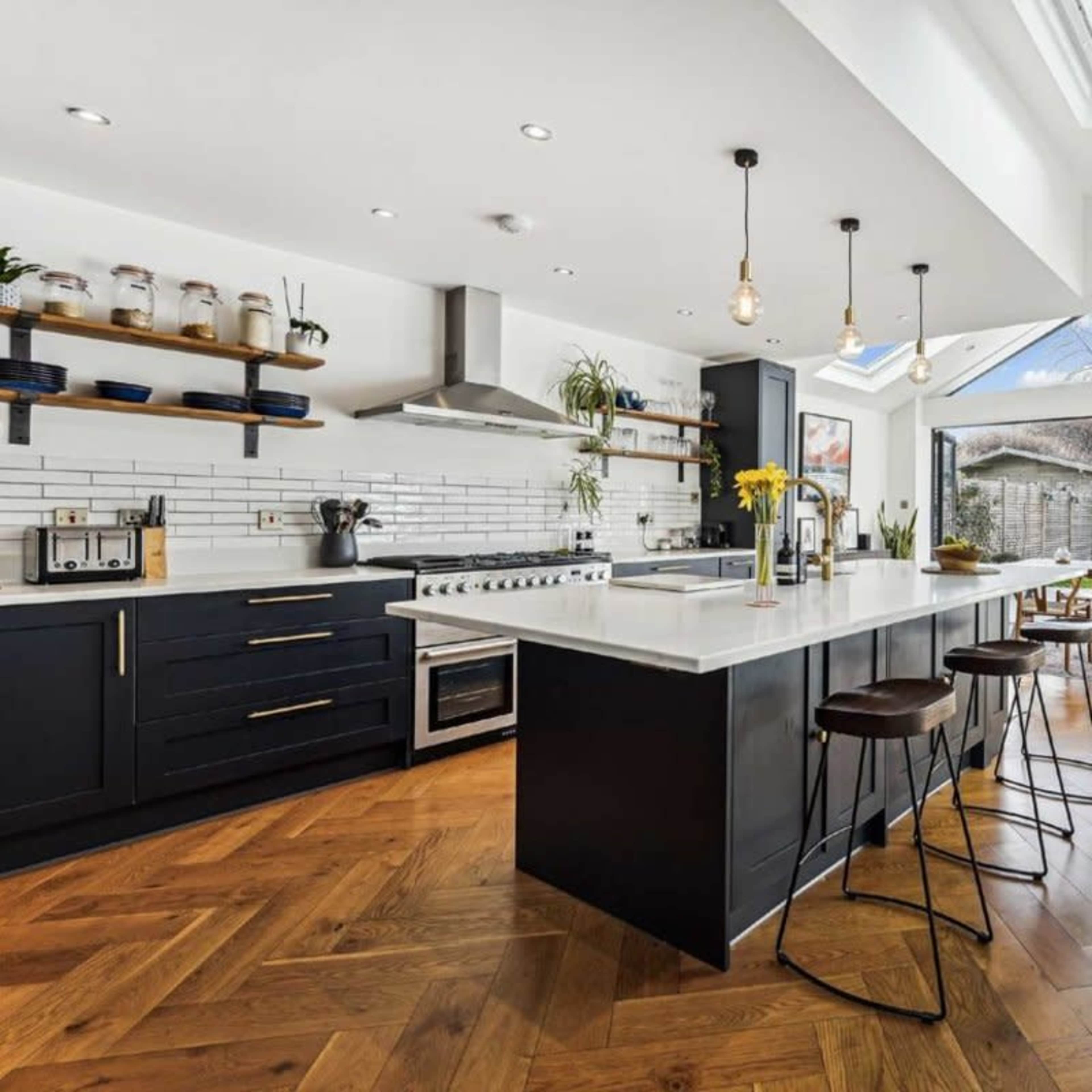 Bright, modern and unique family terraced home with extension and outdoor bar Image in Tooting, London, England