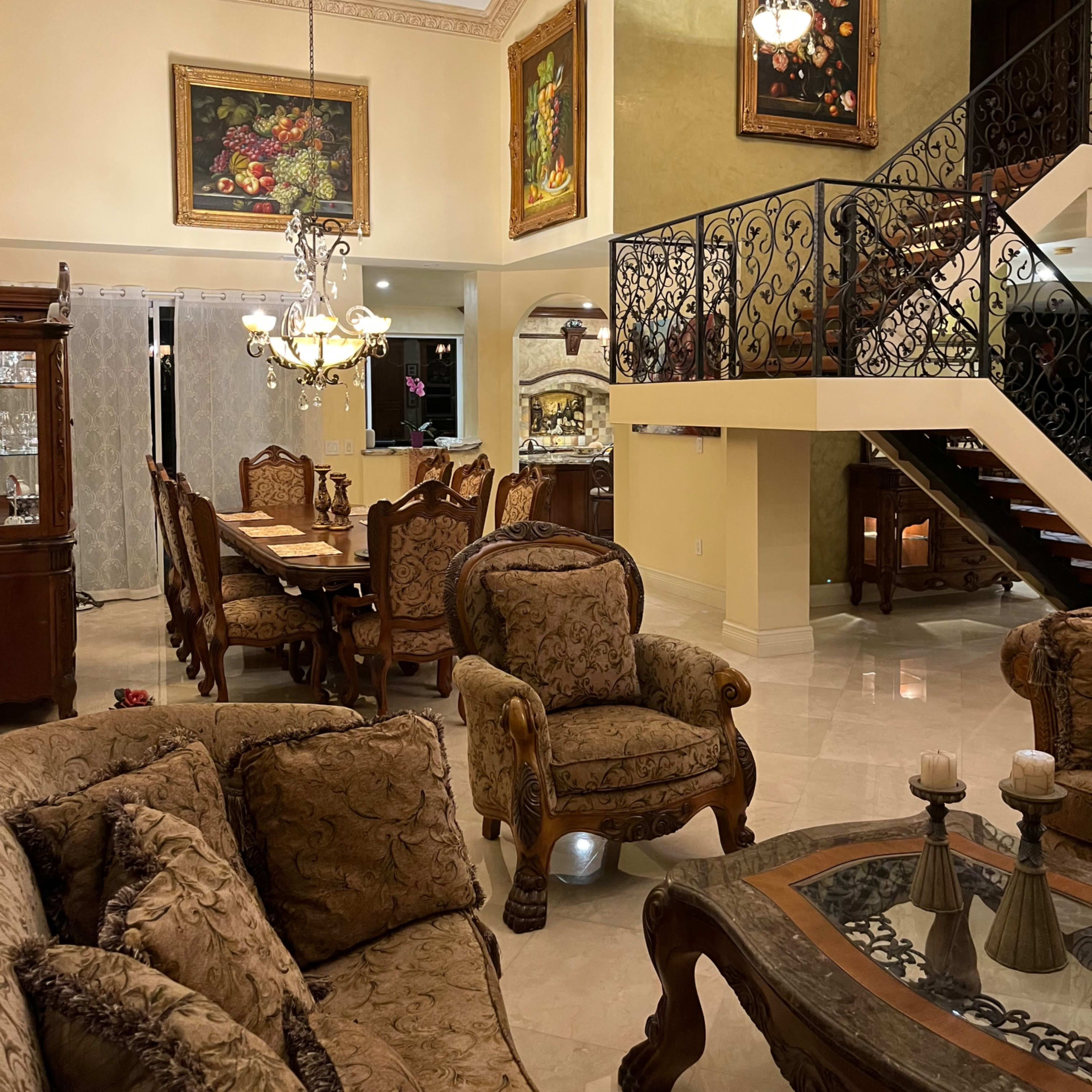 Elegant Mediterranean Style Home With Ornate Grand Staircase Image in West End, Miami, FL