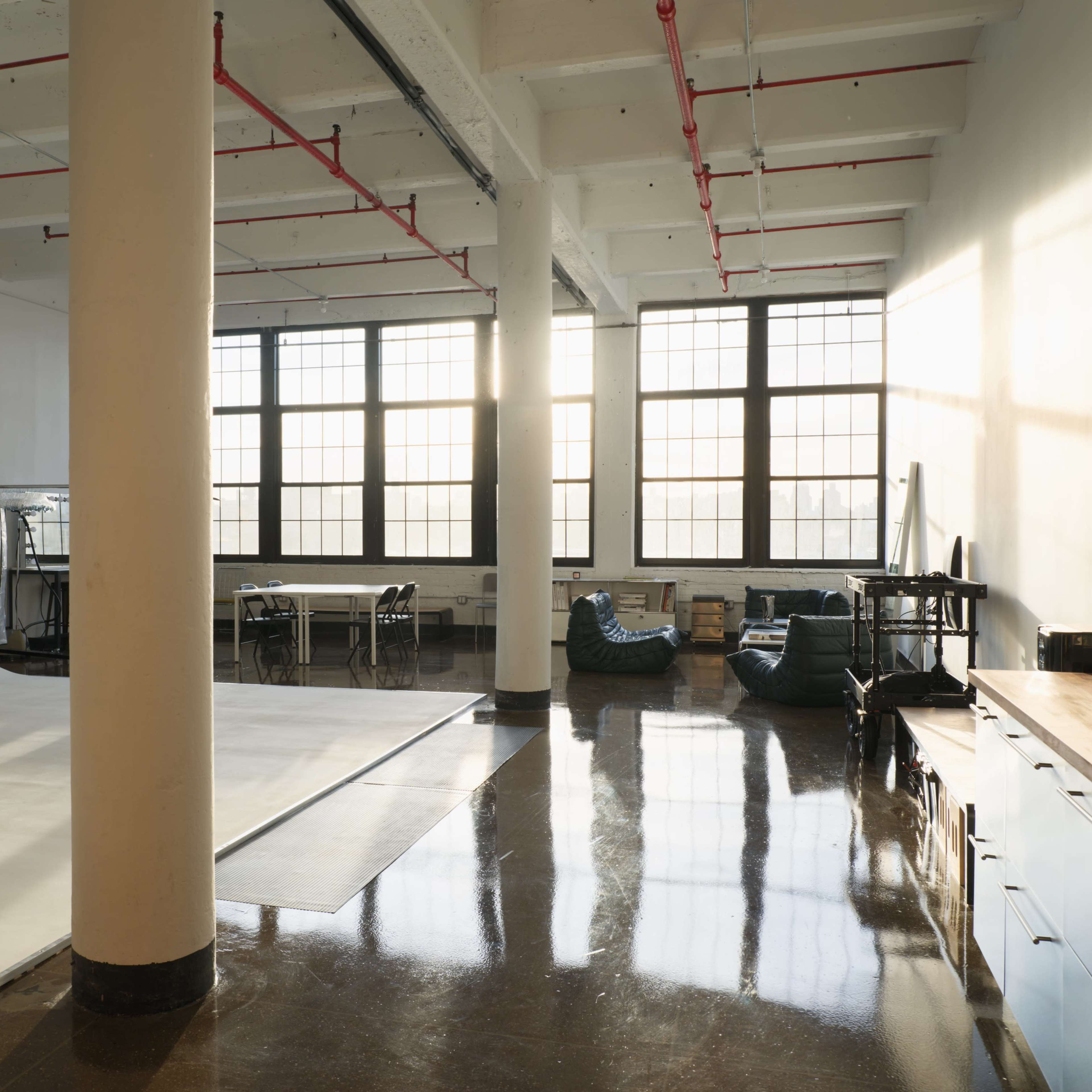 Bright Studio With Cyc Wall And Designer Furniture Image in Bushwick, Brooklyn, NY