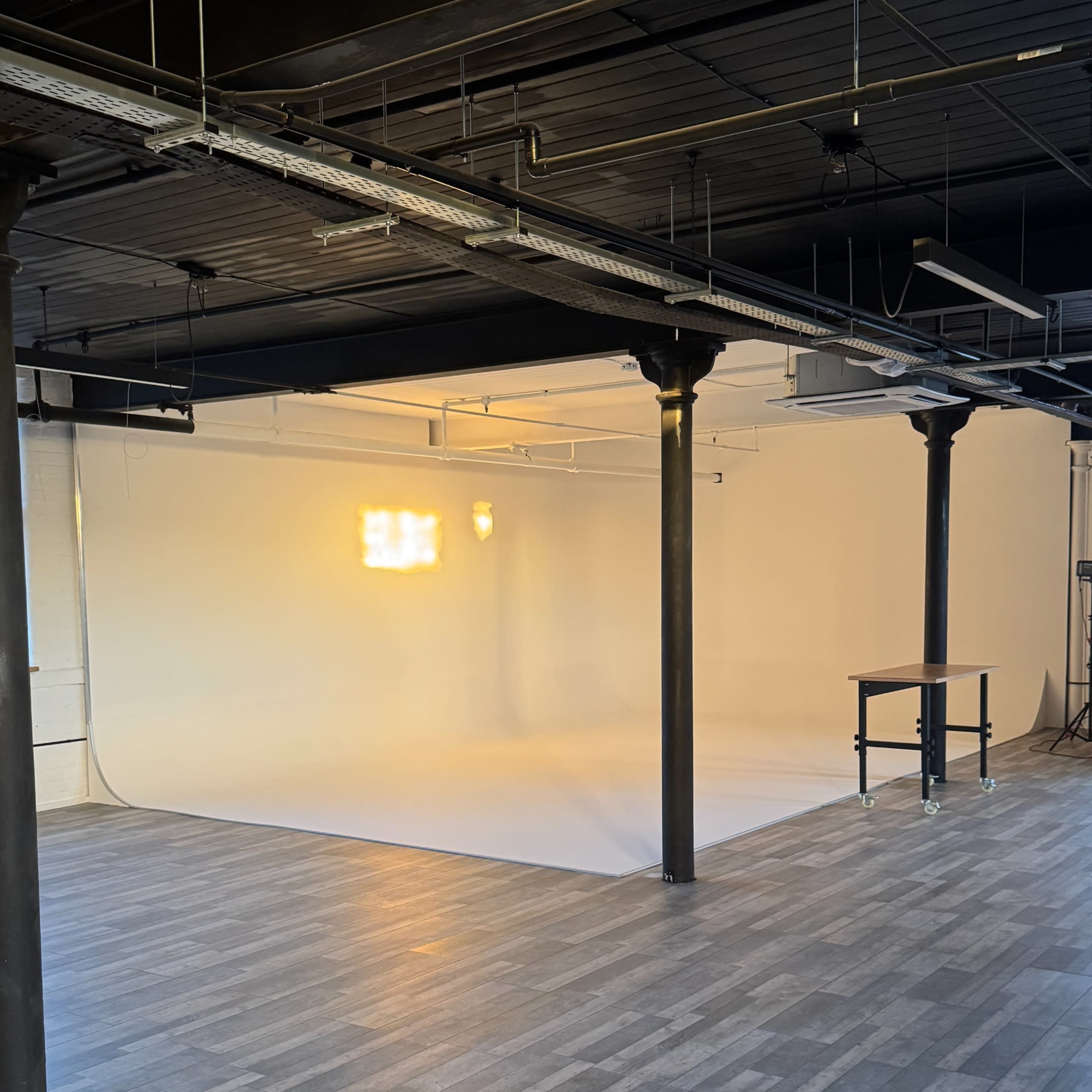 Photo and Video studio with Infinity Cove Image in Central Retail District, Manchester, England
