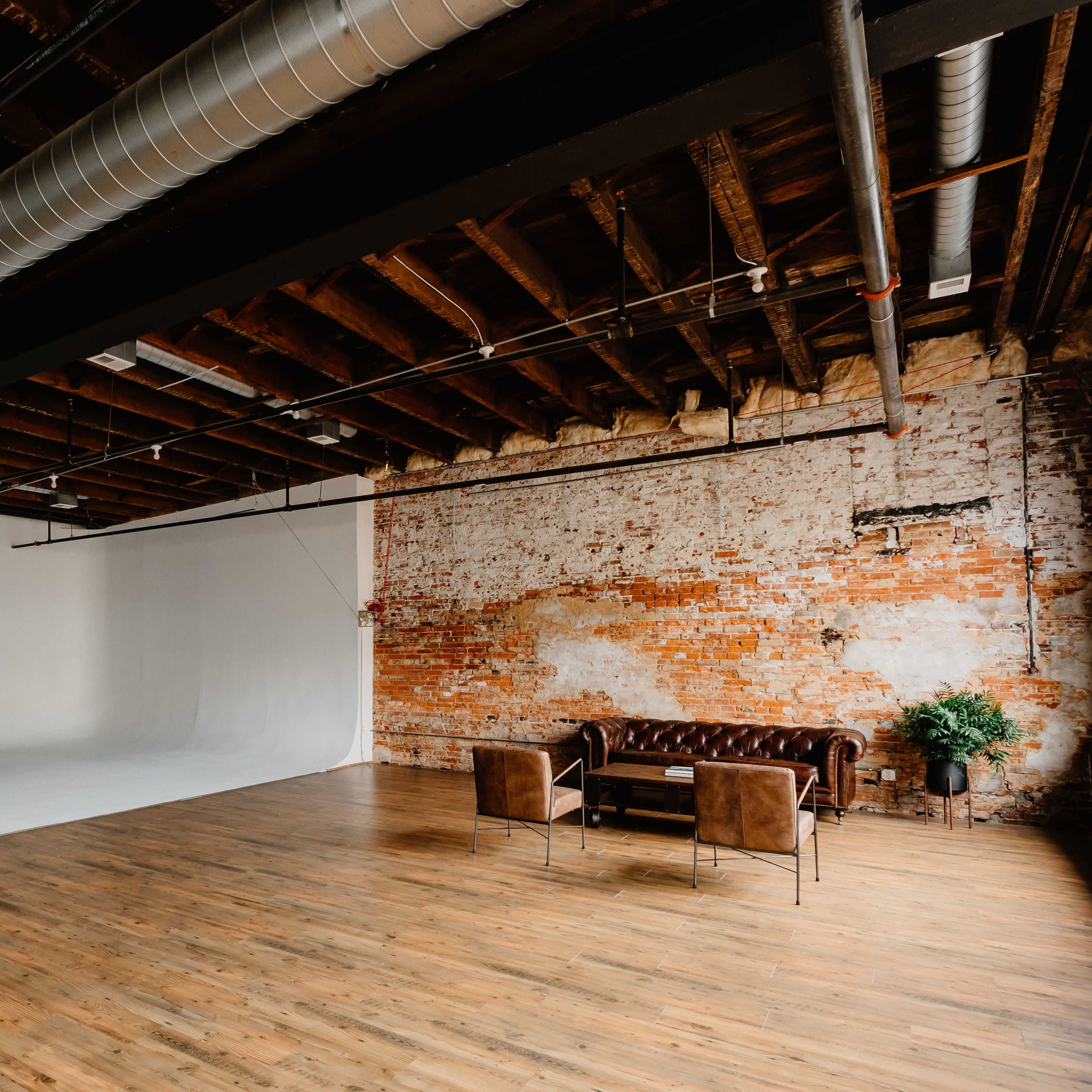 Downton Industrial Loft. Exposed Brick and Natural Light Image in Wilmington, Wilmington, DE