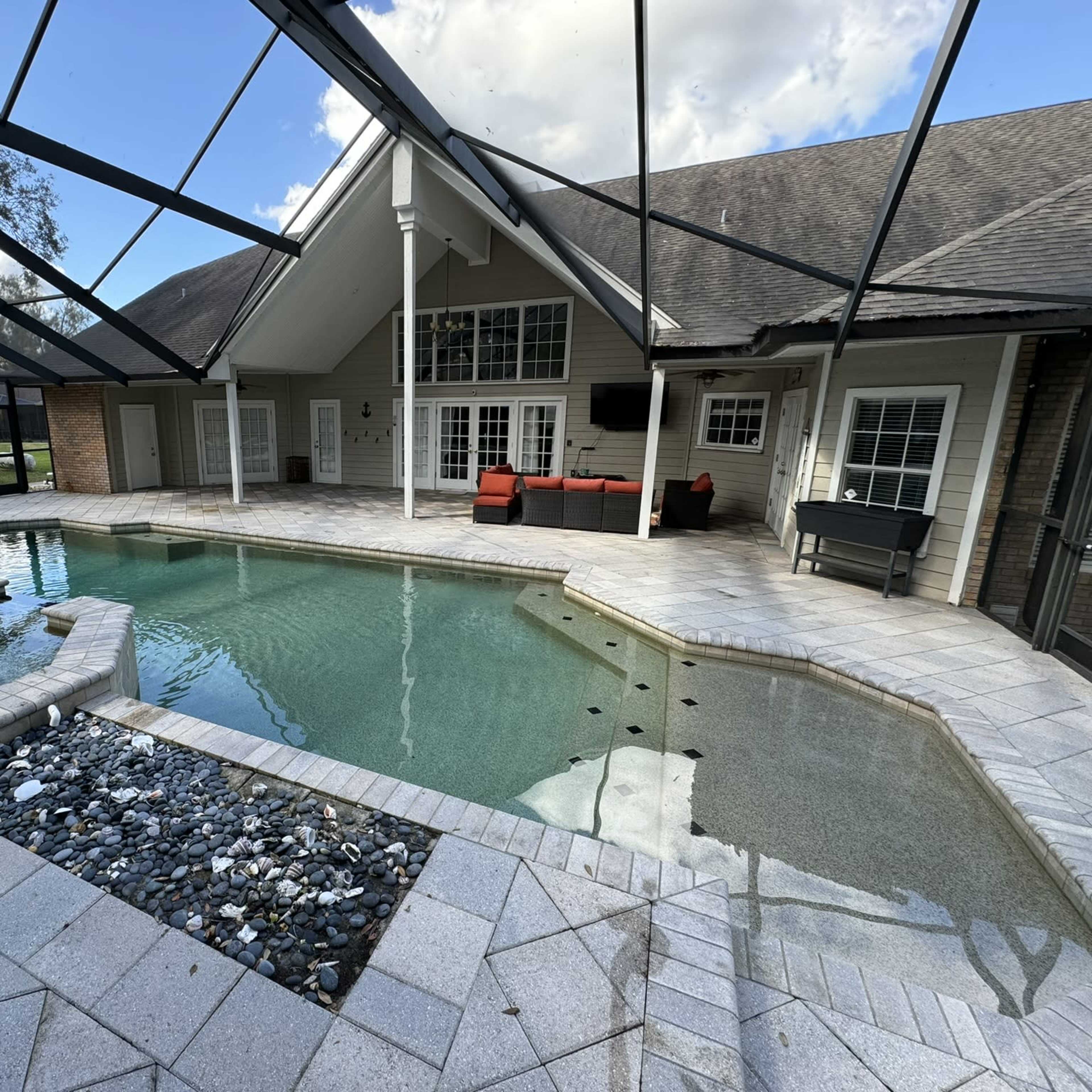 Pool with lush greens Image in Lutz, Lutz, FL