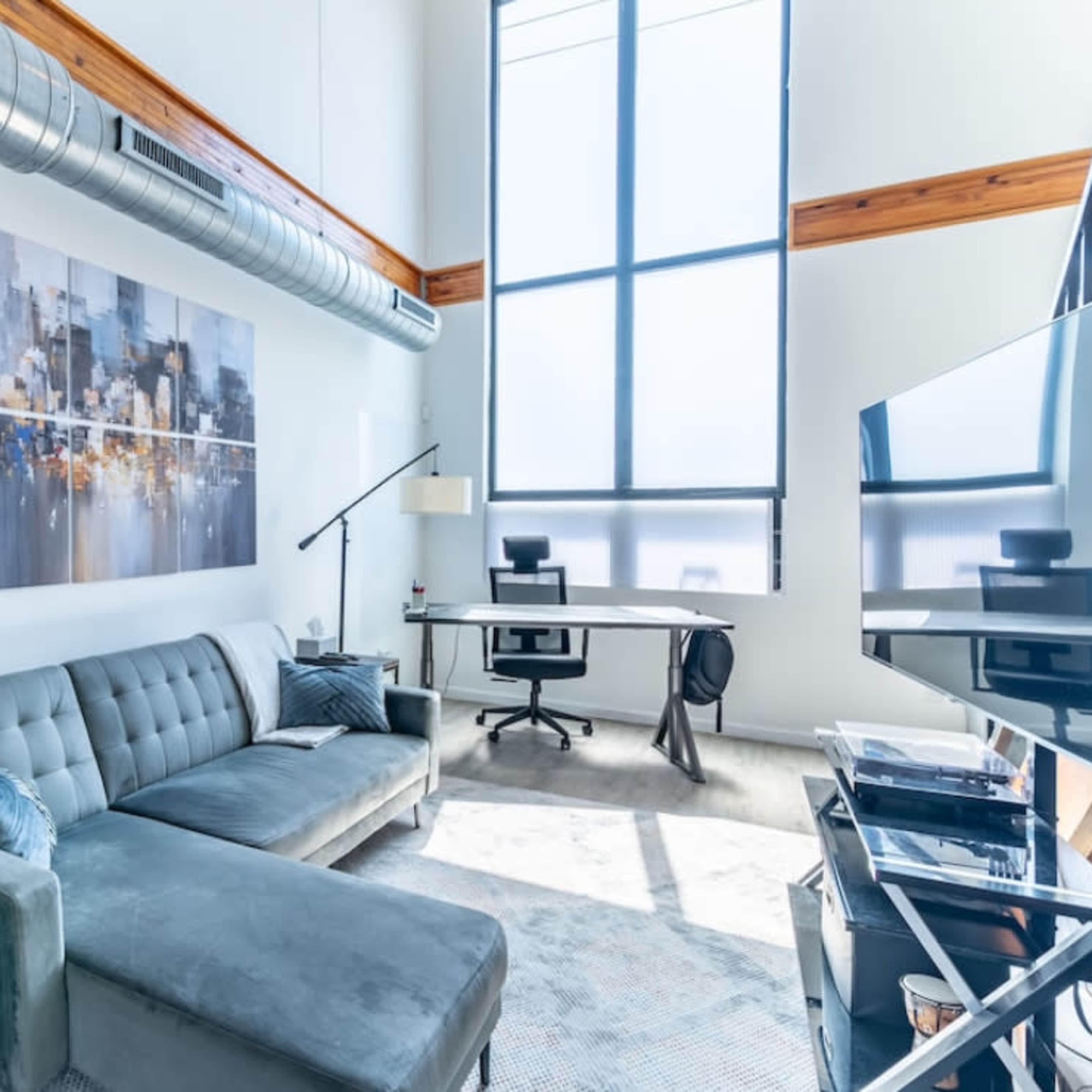 Urban Loft Oasis with Beautiful Natural Light, Piano, & Rooftop with Skyline Views. Image in East Passyunk Crossing, Philadelphia, PA