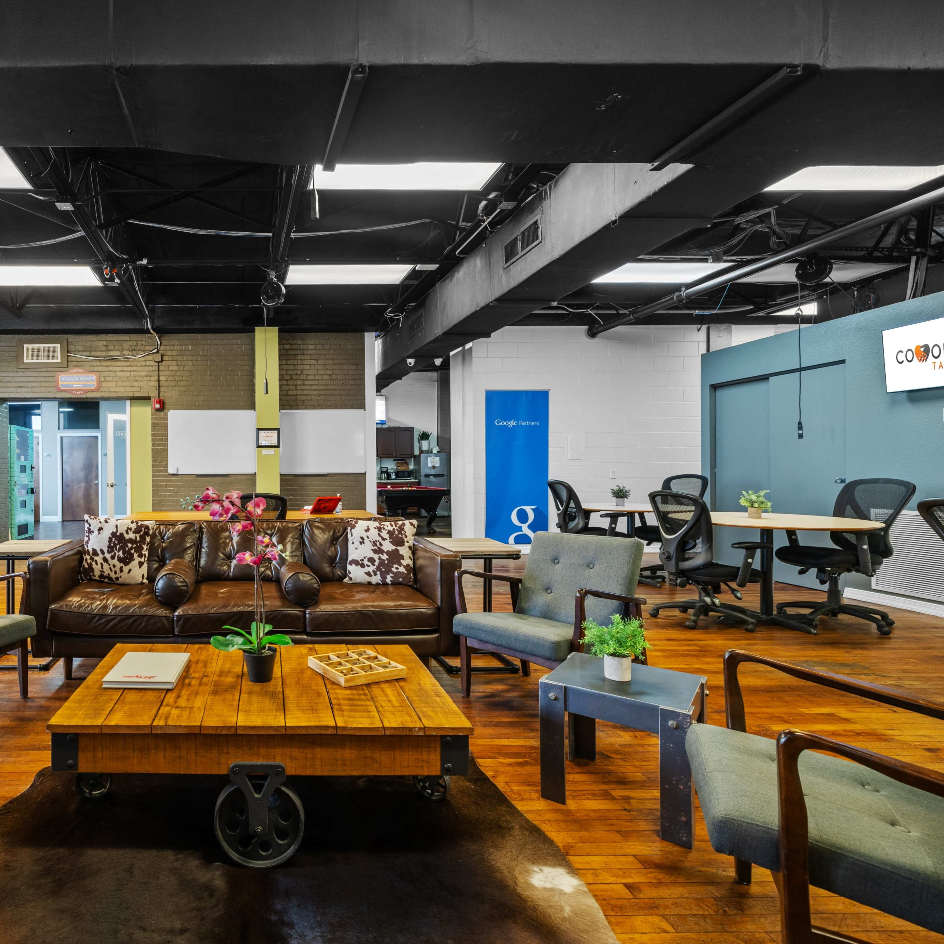 Open Working Space in Vibrant Industrial Building Image in Northeast MacFarlane, Tampa, FL
