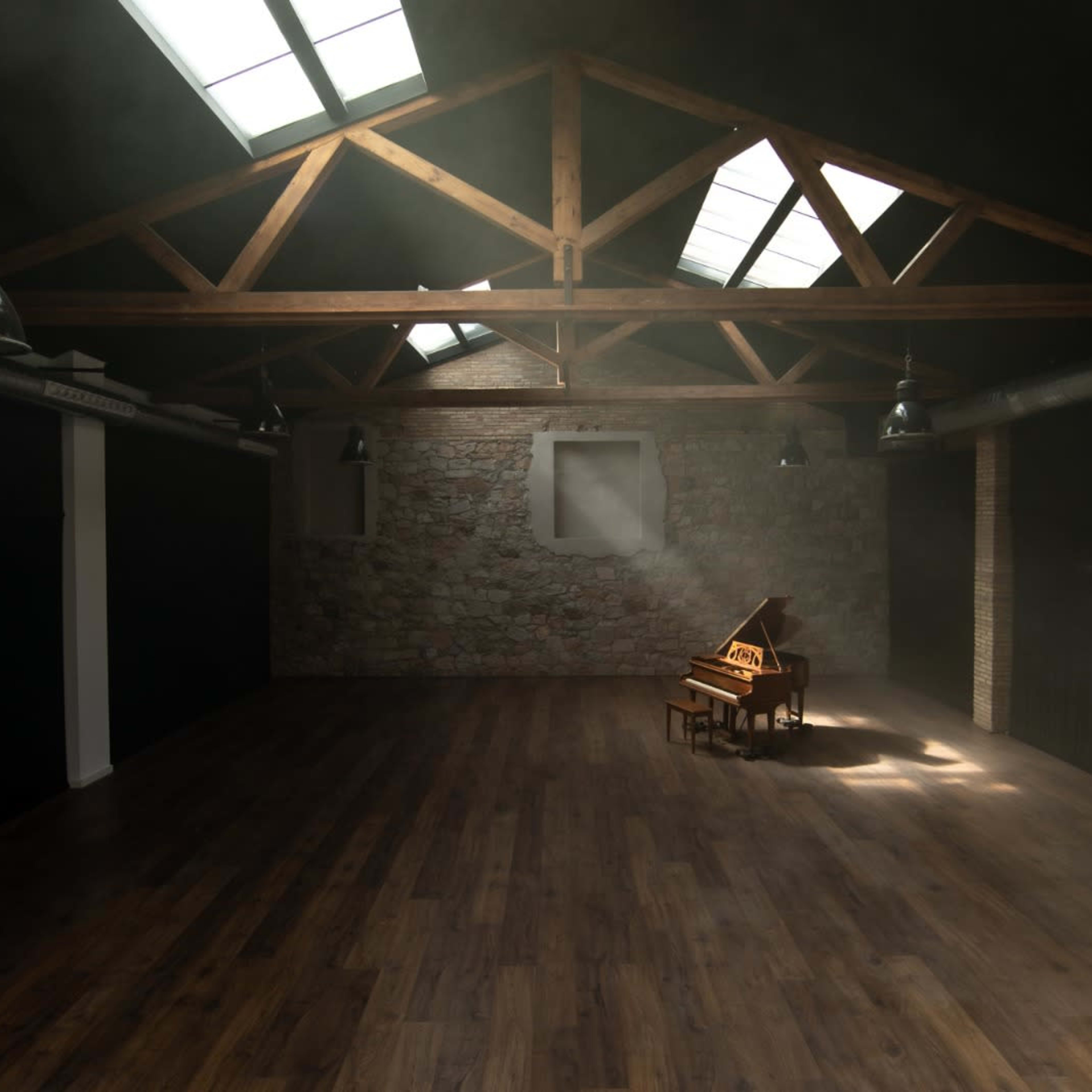 A grand piano sits in an empty room with wooden beams and large skylights illuminating the space.