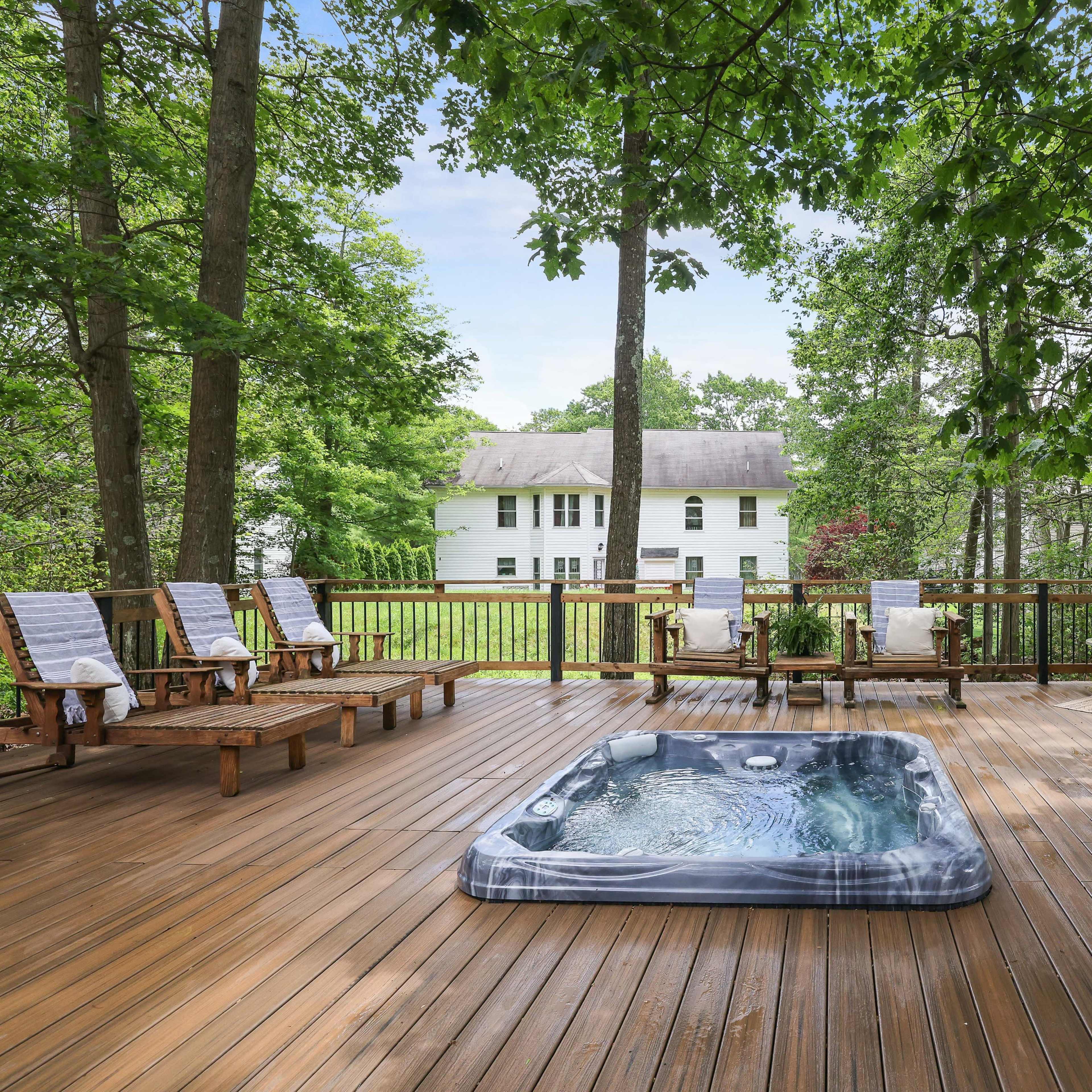 Poconos Villa with Large decks, hot tub, fire pit. Image in Coolbaugh Township, Monroe County, PA
