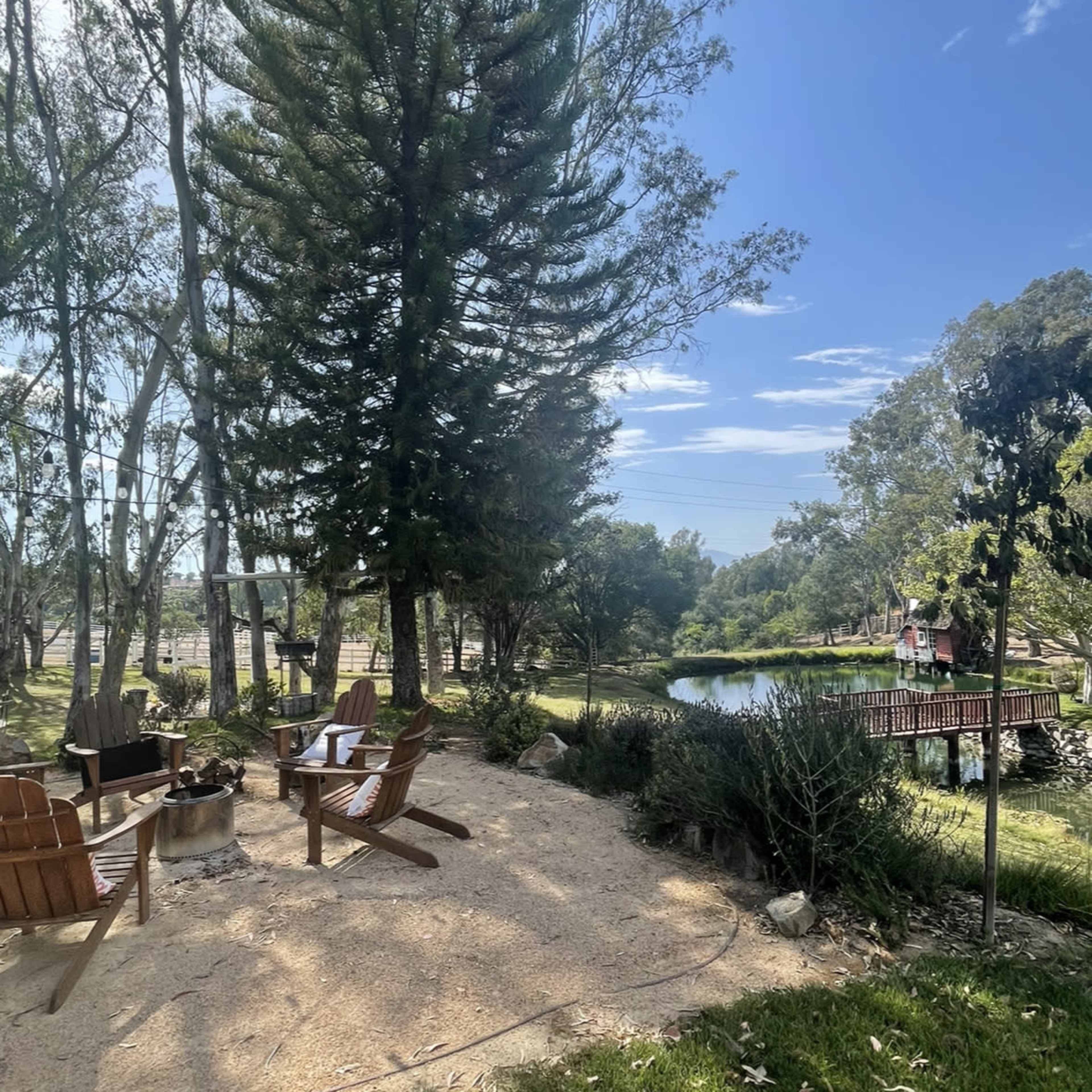 Outdoor oasis with large pond, island and unbeatable golden hour shrouded in trees, hills, mountains, and open spaces Image in , Fallbrook, CA