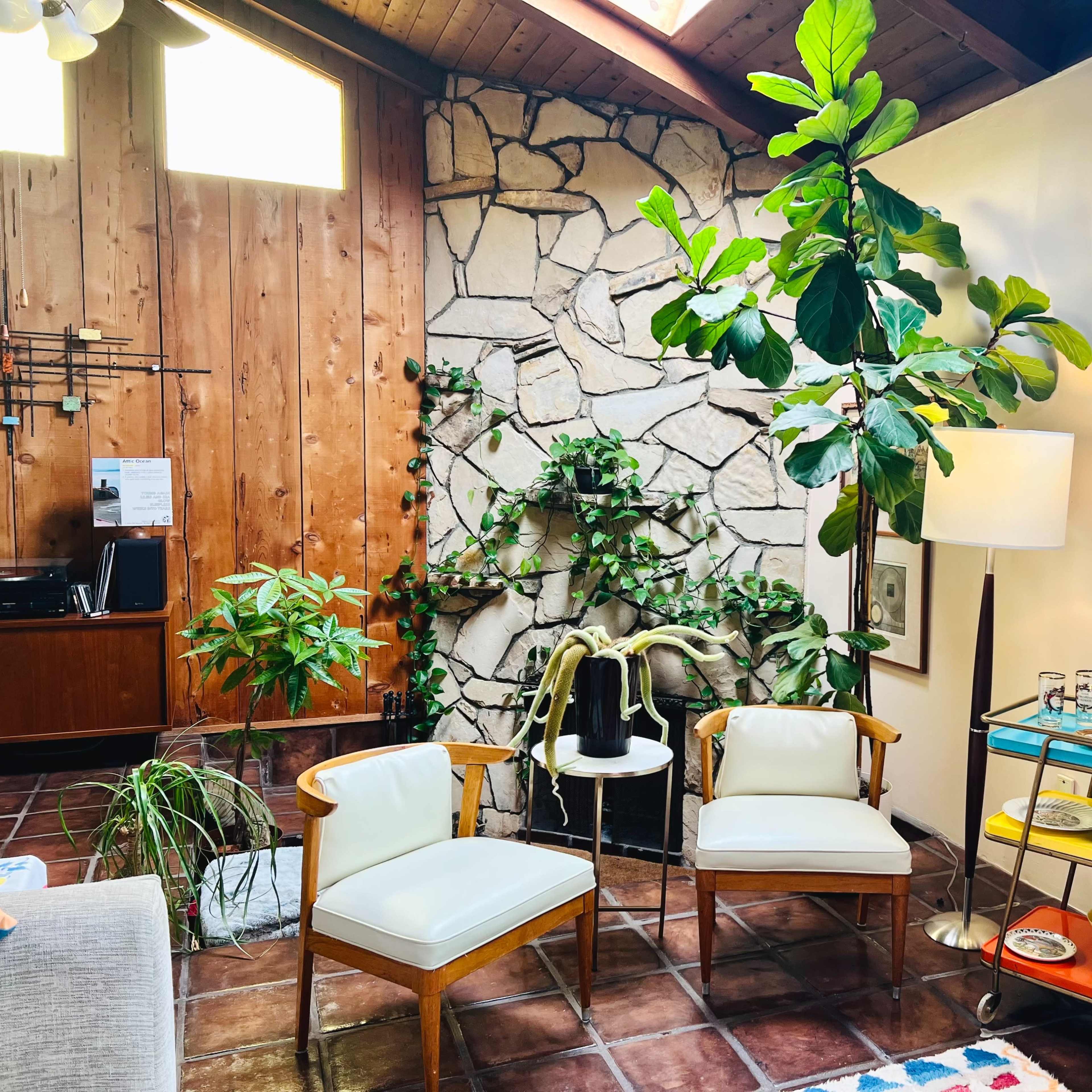 Colorful Midcentury Vaulted Family Room w/Bar, Sunken Fireplace, 50s/60s Decor, Greenery, Natural Light Image in Sunset Park, Santa Monica, CA