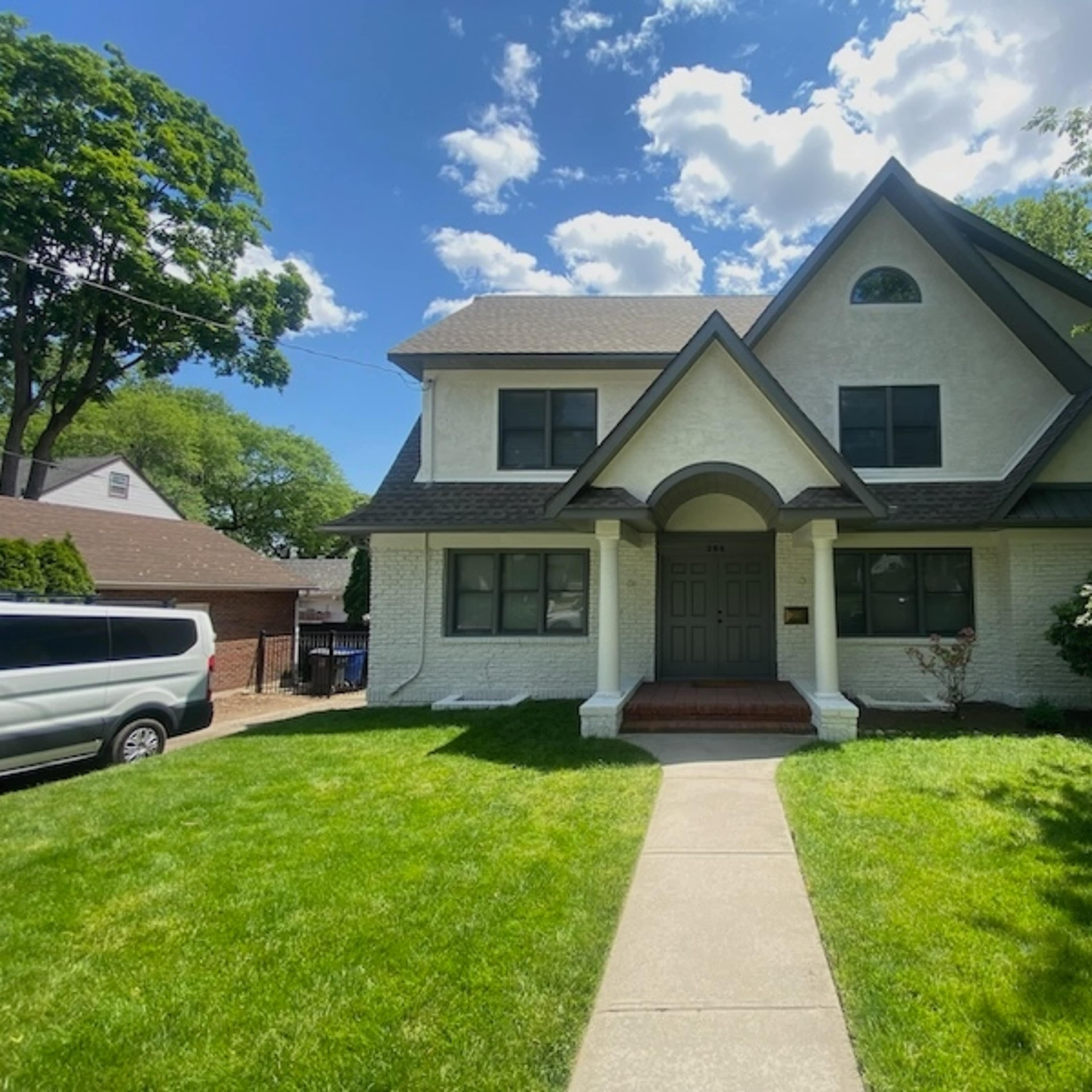 Spacious Center Hall Colonial :  5 Bedrooms, Primary Loft, Natural light, Driveway, Backyard Image in Englewood, Englewood, NJ