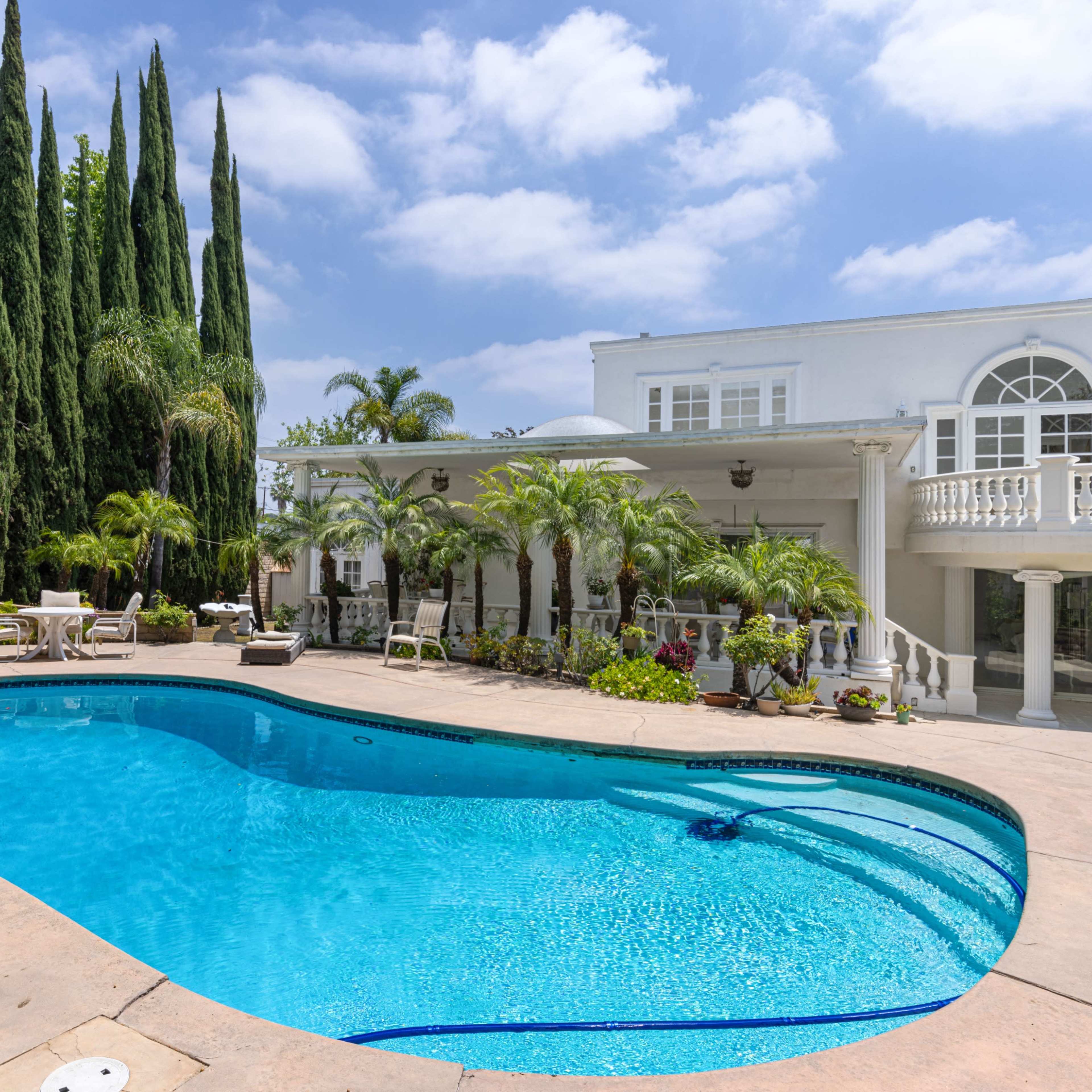 Ancient Greek & Persian Style White Mansion with Natural Light Image in Northridge, Los Angeles, CA