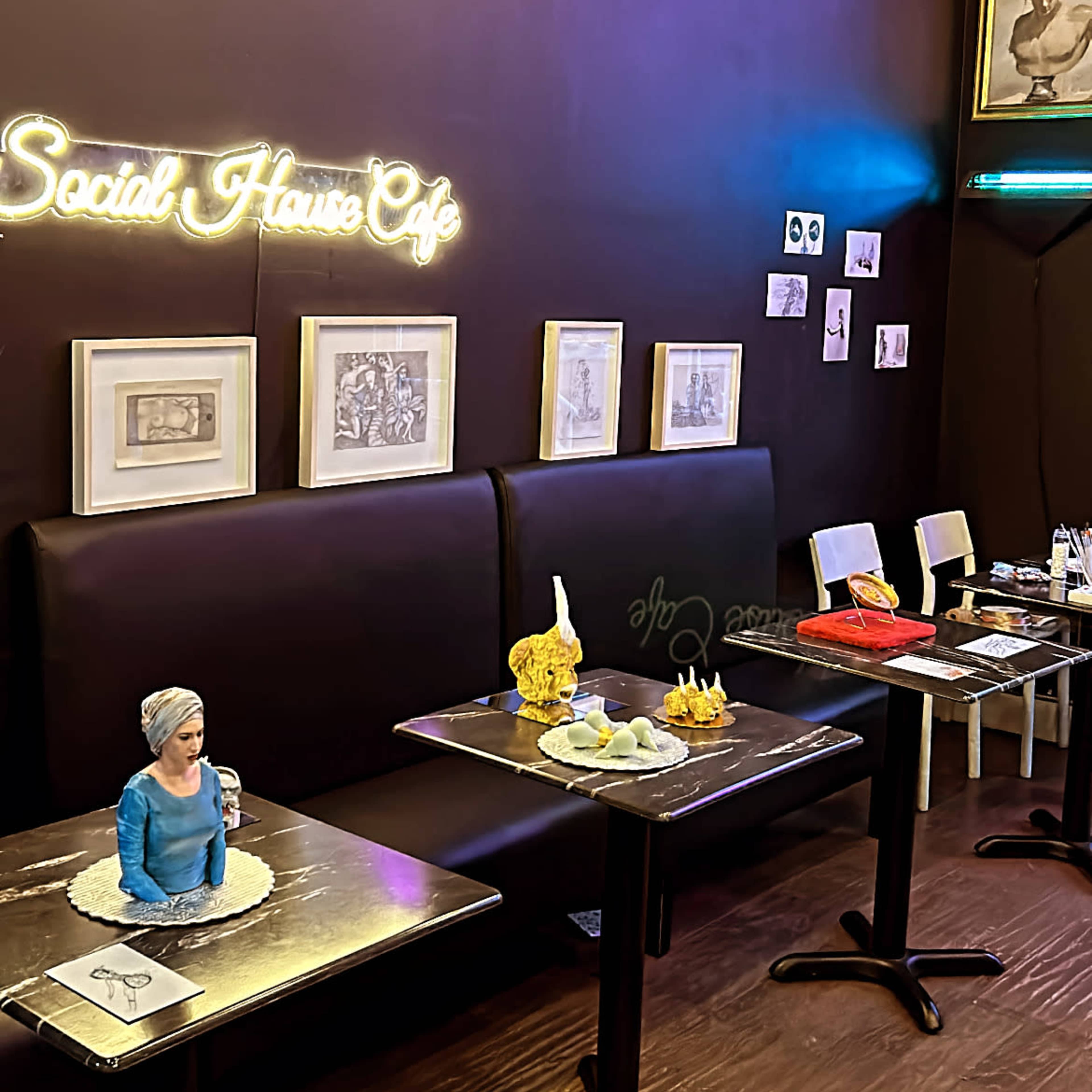 intimate Art Exhibition inside of trendy bar. Image in , Brooklyn, NY