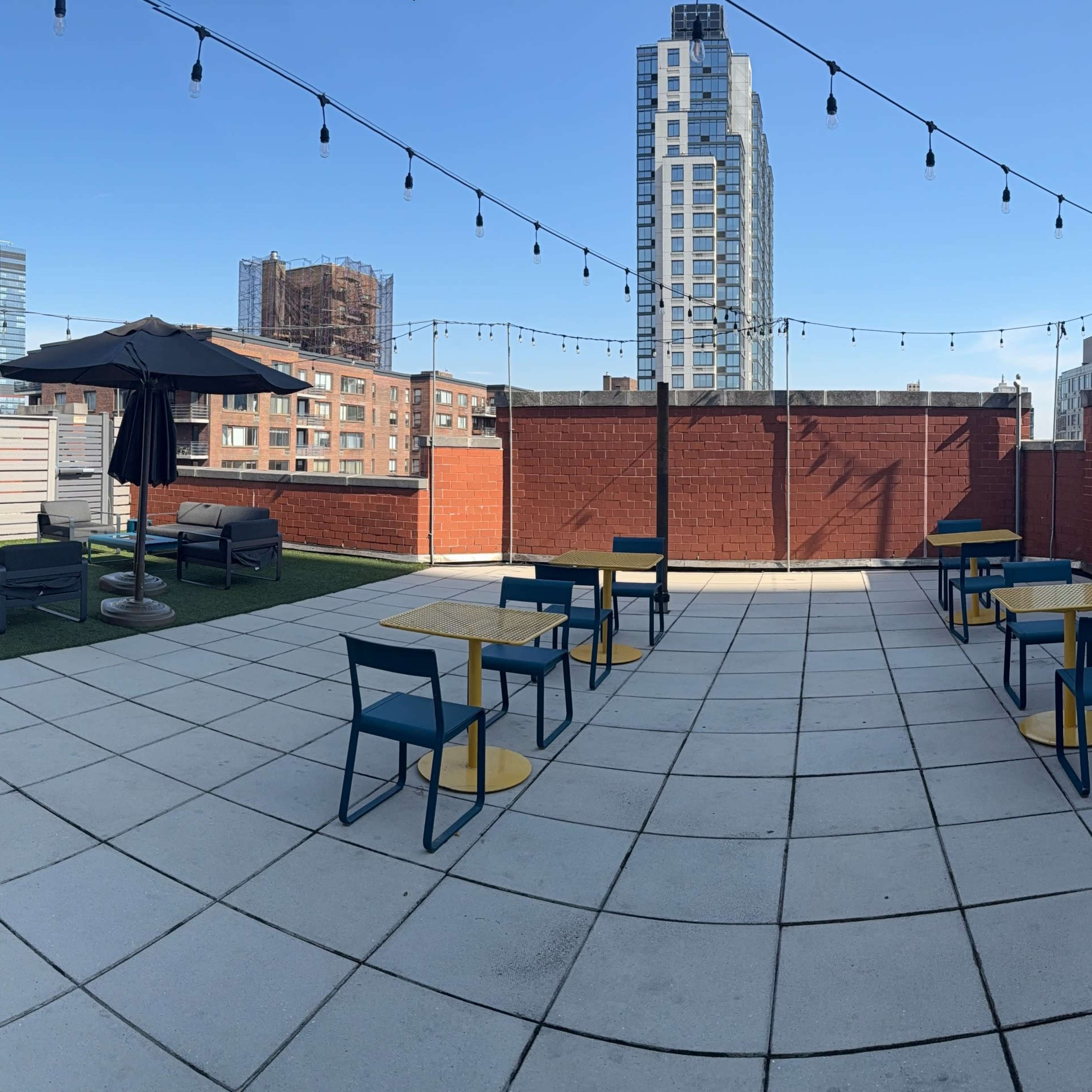 Vibrant Rooftop Sundeck with Stunning City Views & Grills Image in Upper West Side, New York, NY
