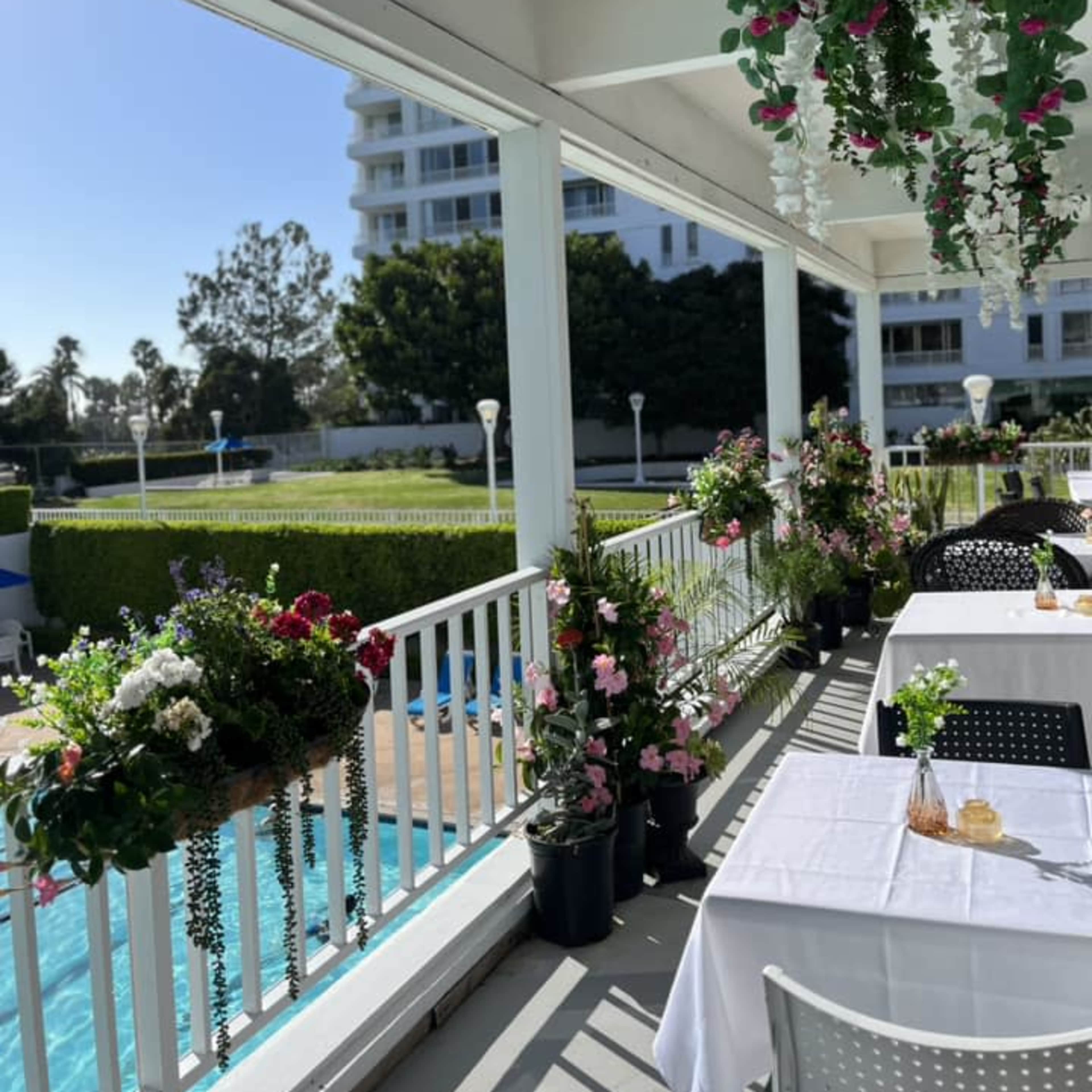 Private Dining Area with balcony Overlooking the Pool and Beach Image in Ocean Park, Santa Monica, CA