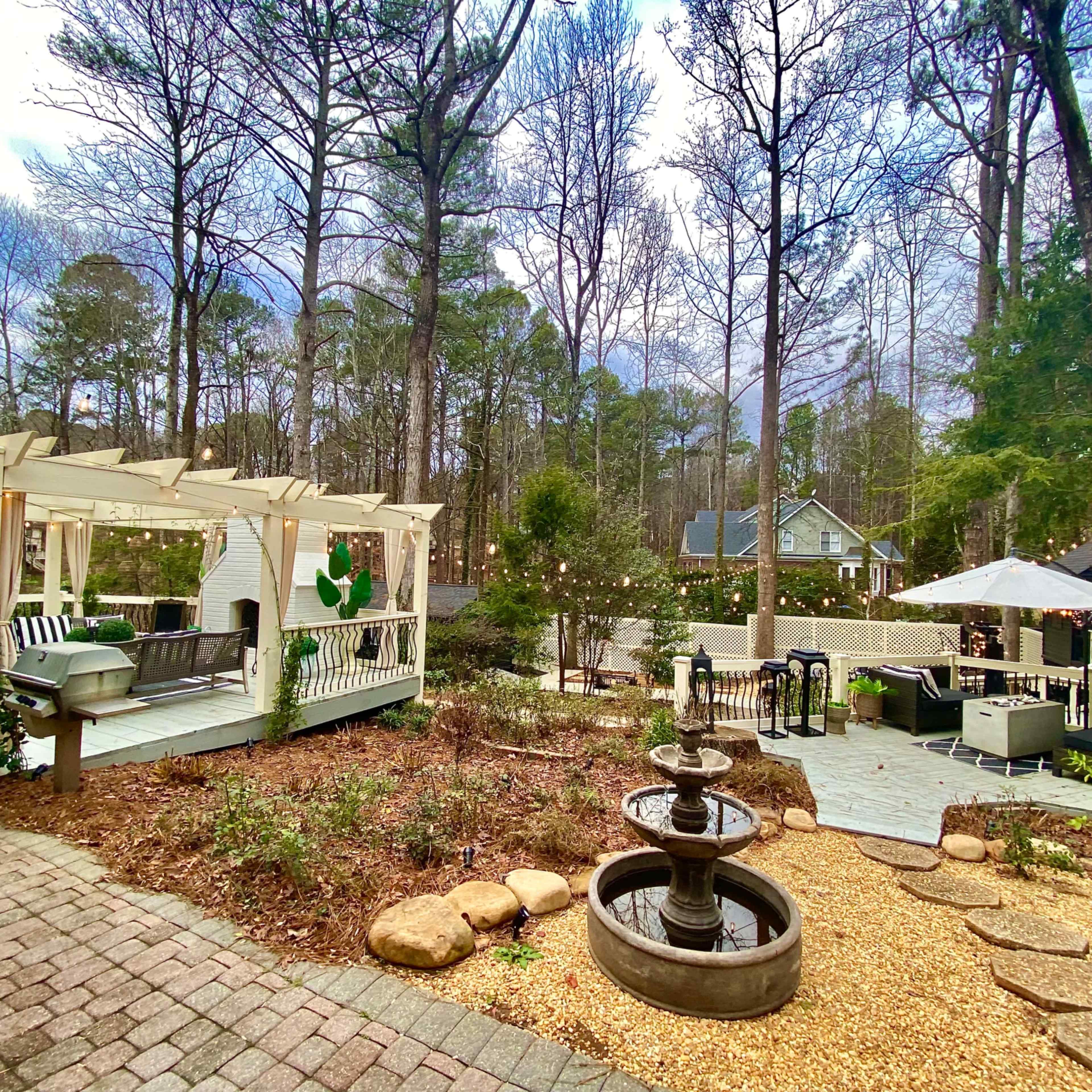 DREAM romantic backyard perfect for mini wedding, proposal, engagement reception, family gathering. Multiple seating areas, outdoor fireplace, library Irish Pub, Art studio and more! Image in , Duluth, GA