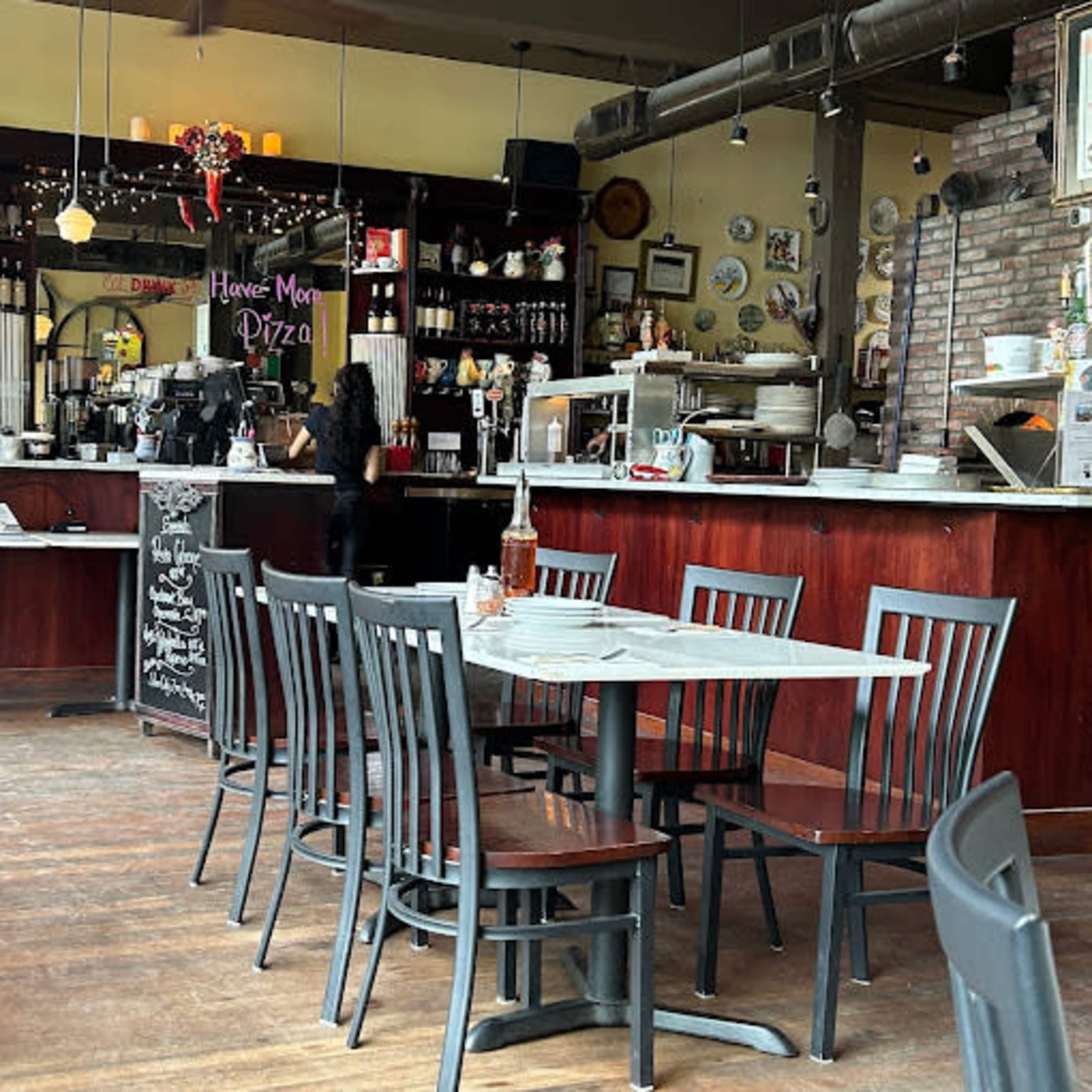Intimate dining space with wood fired pizza oven in a 1911 building Image in Rainier Valley, Seattle, WA