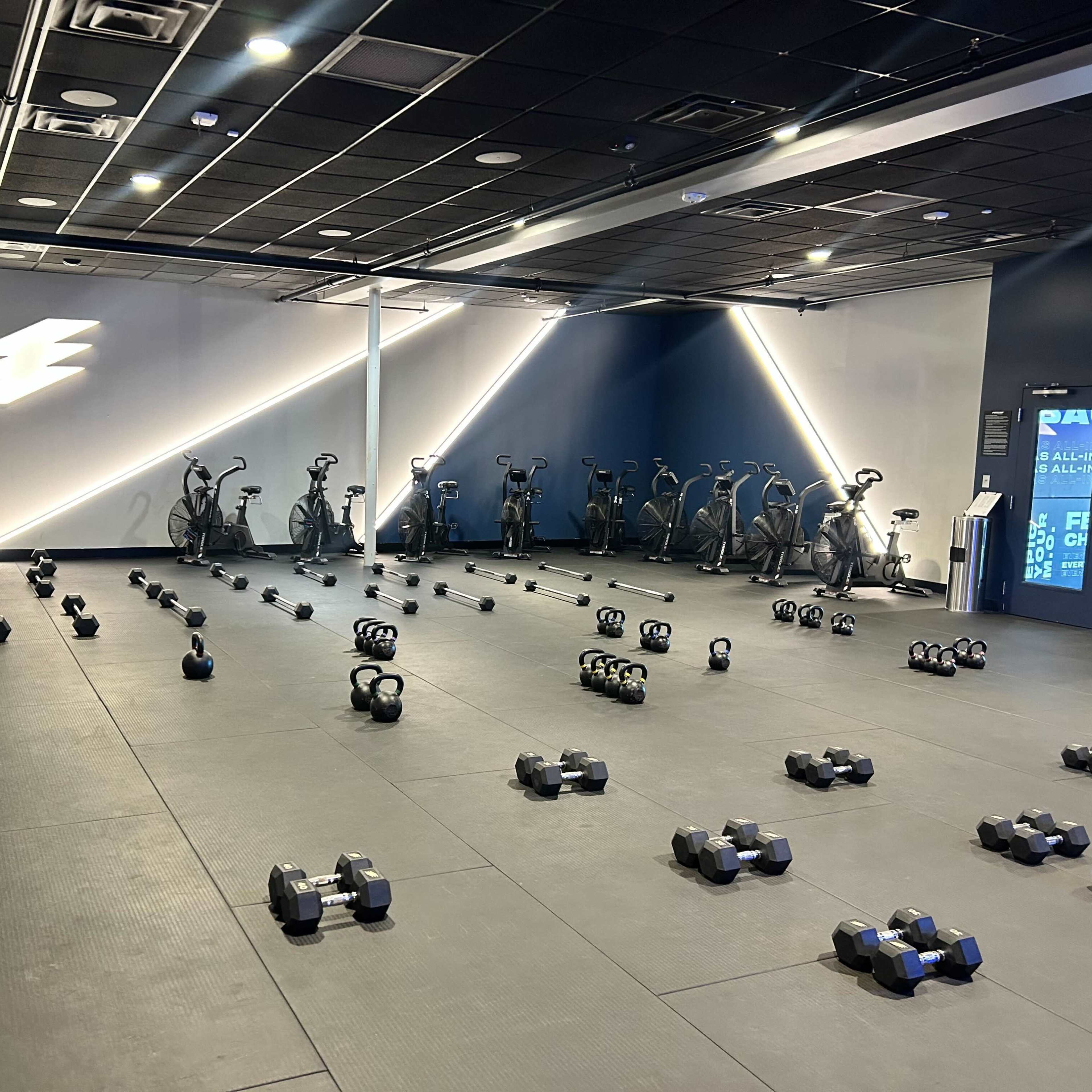Modern High-Energy Fitness Studio with Sleek Design & Lighting in Oviedo Image in Oviedo, Oviedo, FL