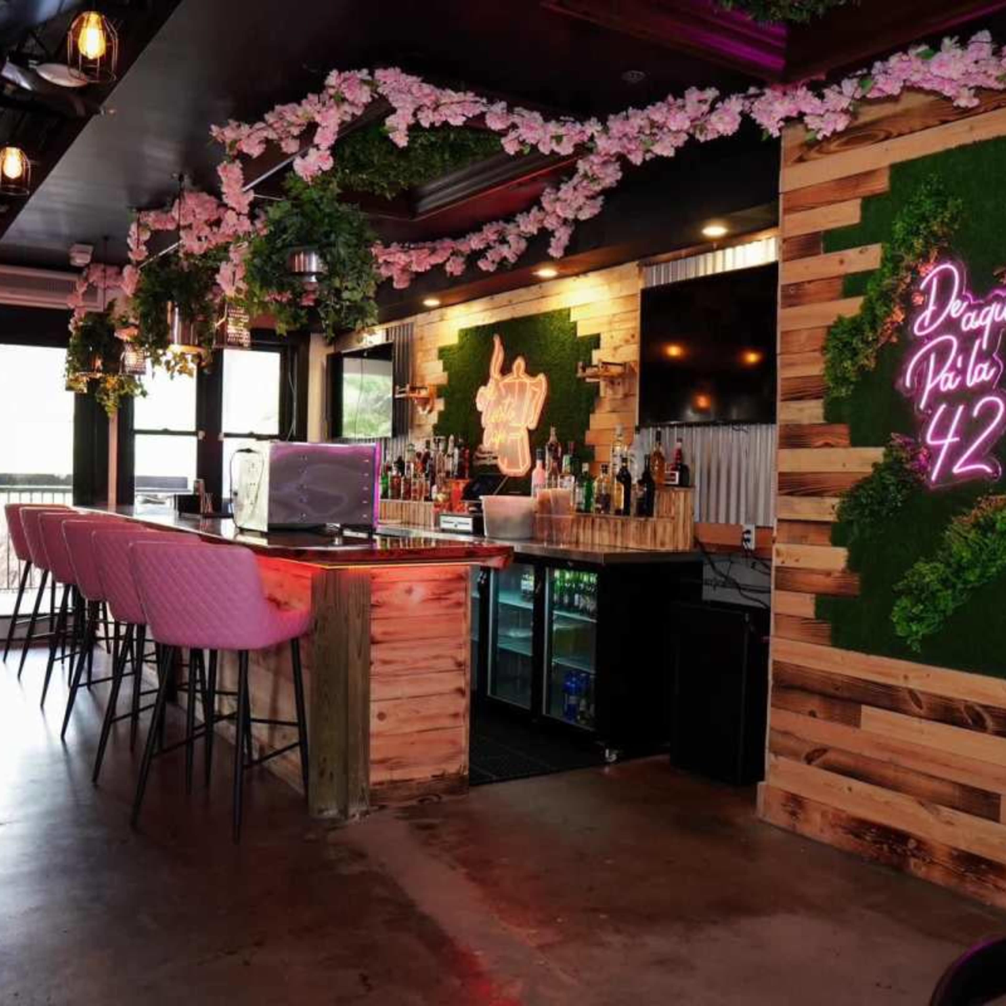 Downtown , edgy, bar / lounge venue for private events. Decorated with rustic tables and a japan se fusion with cherry blossoms and geishas on the wall. Image in Sailboat Bend, Fort Lauderdale, FL