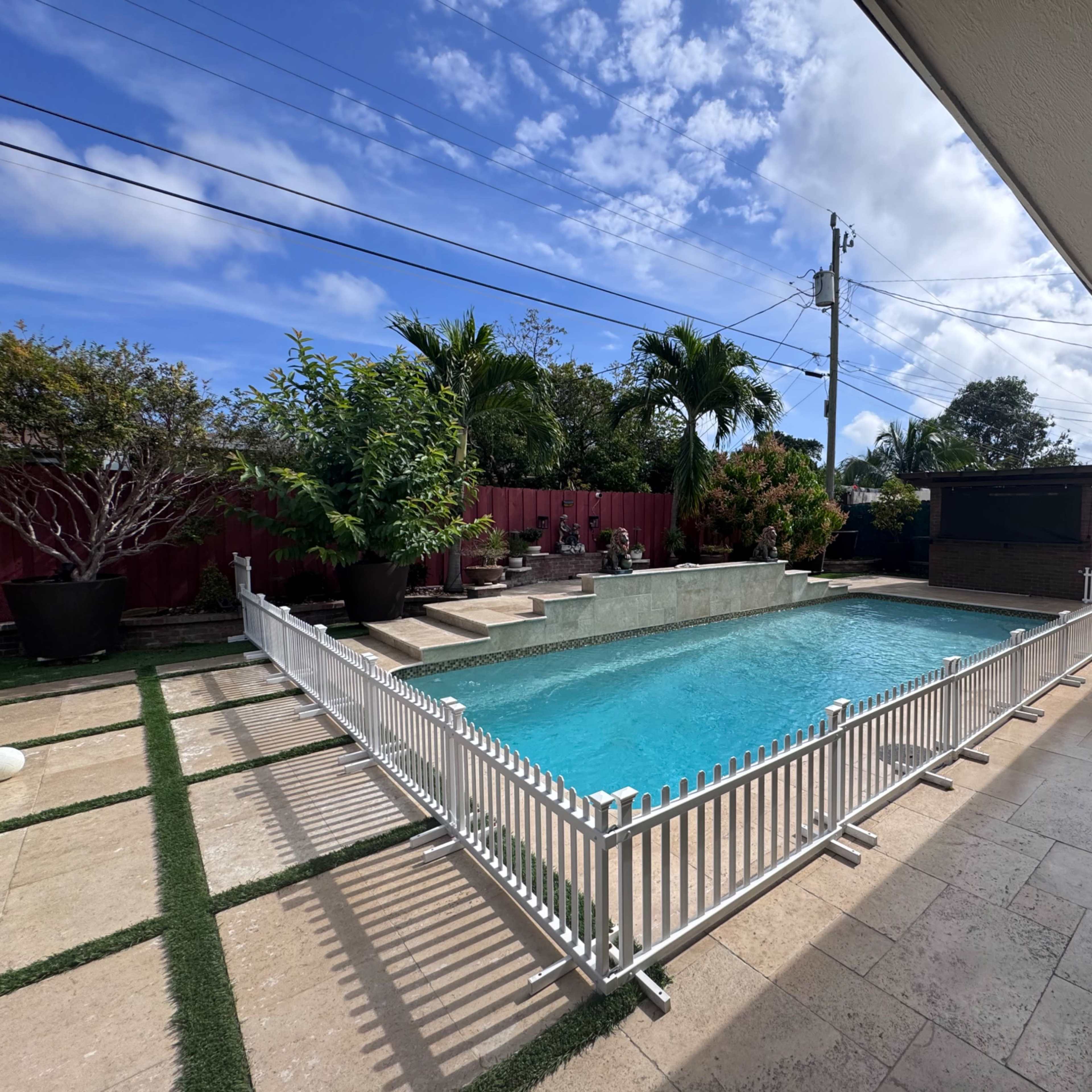 Spacious Backyard with Pool and Outdoor Kitchen Image in Pompano Beach, Pompano Beach, FL