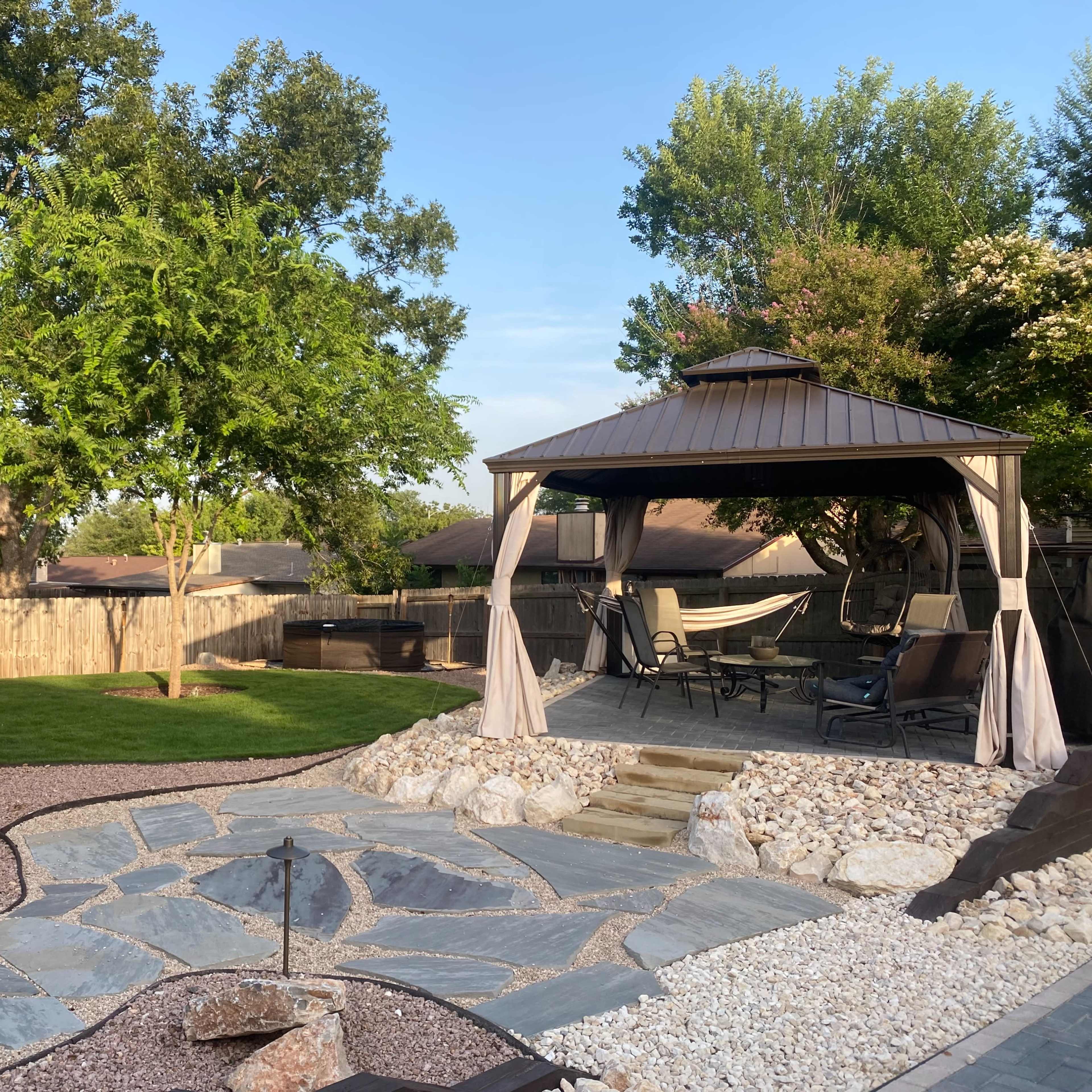 Relaxing Backyard Retreat with Gazebo, Ambient Lighting, Tikis, Speakers, and Food Truck Parking Image in Heritage, San Antonio, TX