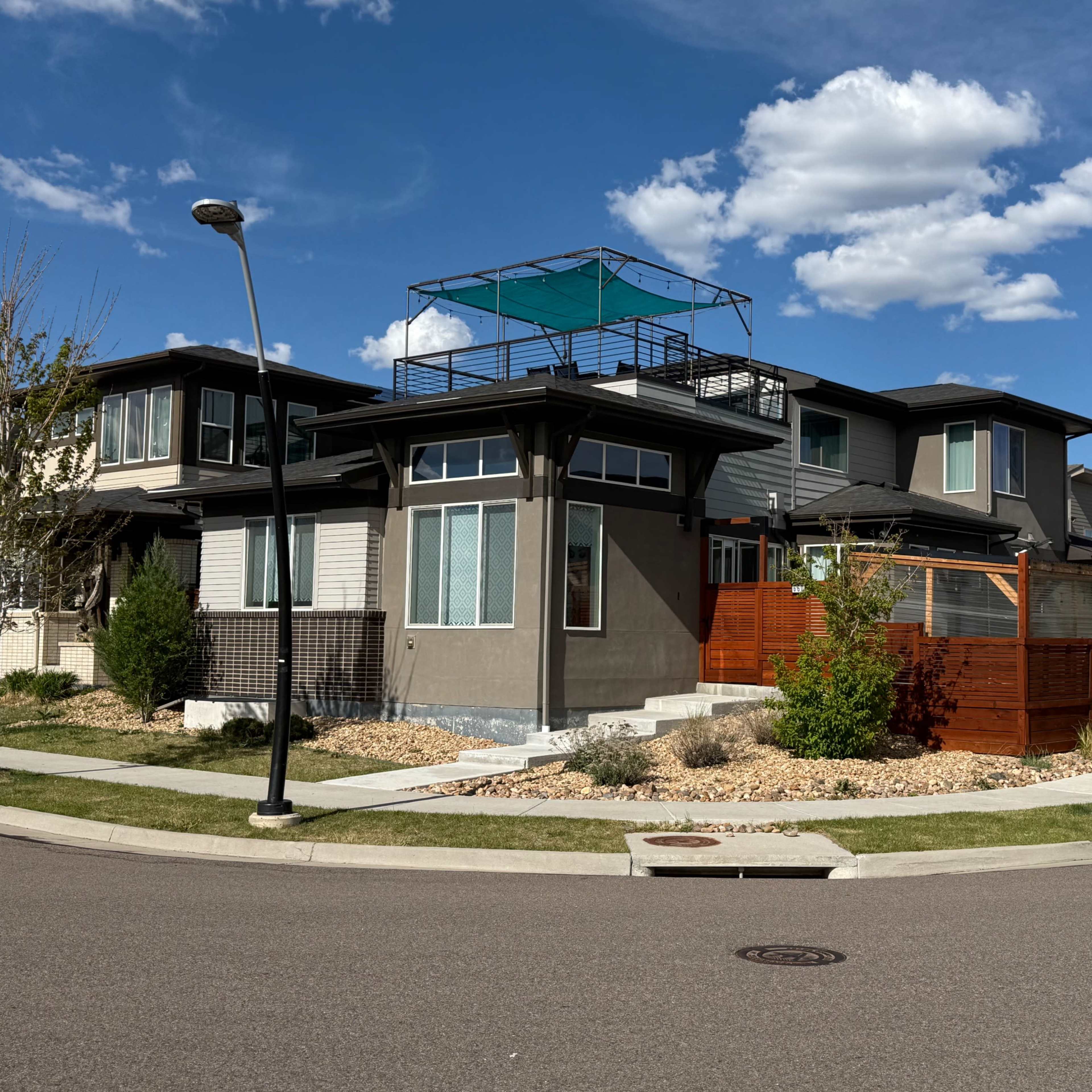 Ultra Modern natural light filled. Rooftop deck with Rocky Mountain View’s. Professional music recording studio. Side yard with gazebo on Astro turf. Image in Westminster, Westminster, CO