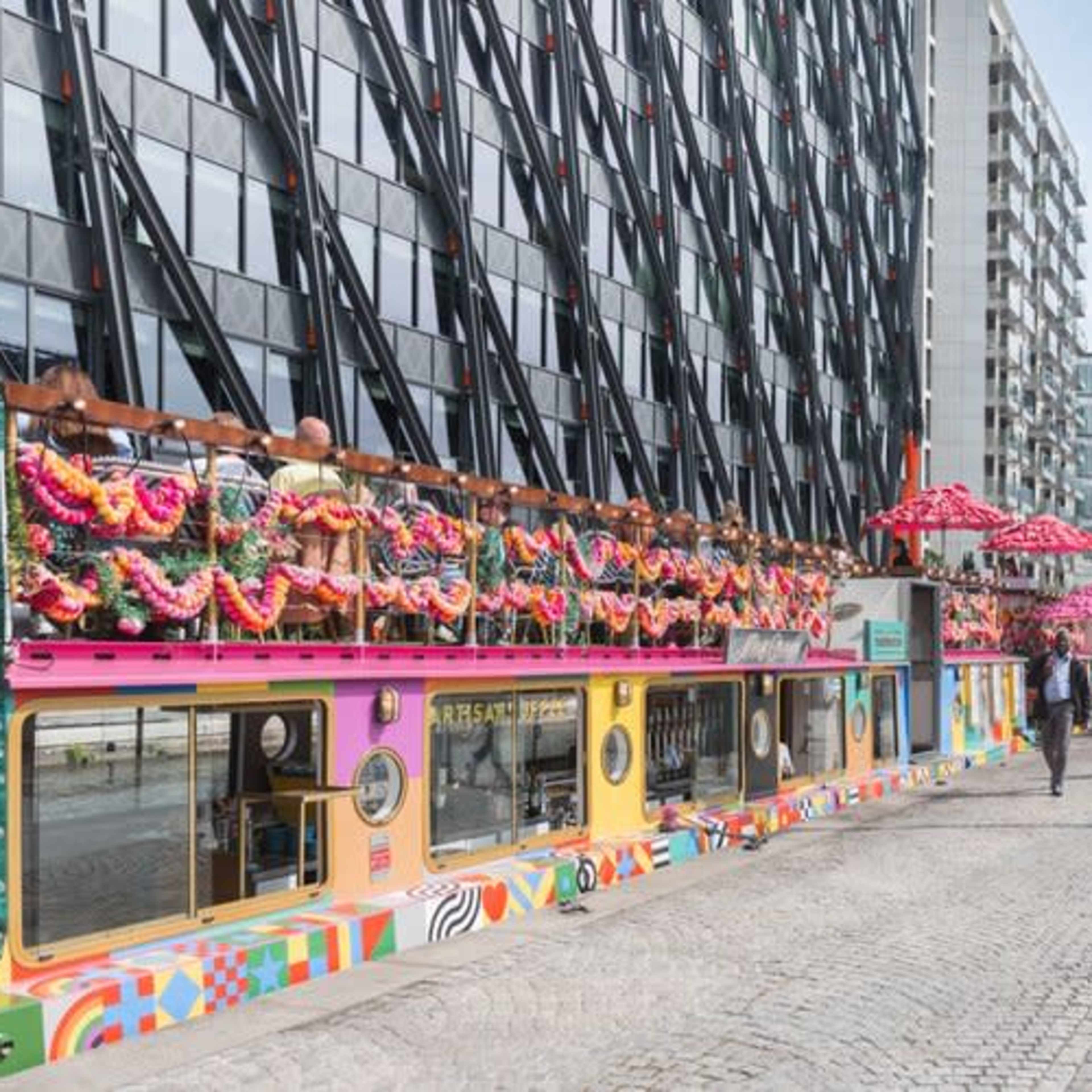 Colourful barge restaurant on the Paddington canal Image in London, London, England