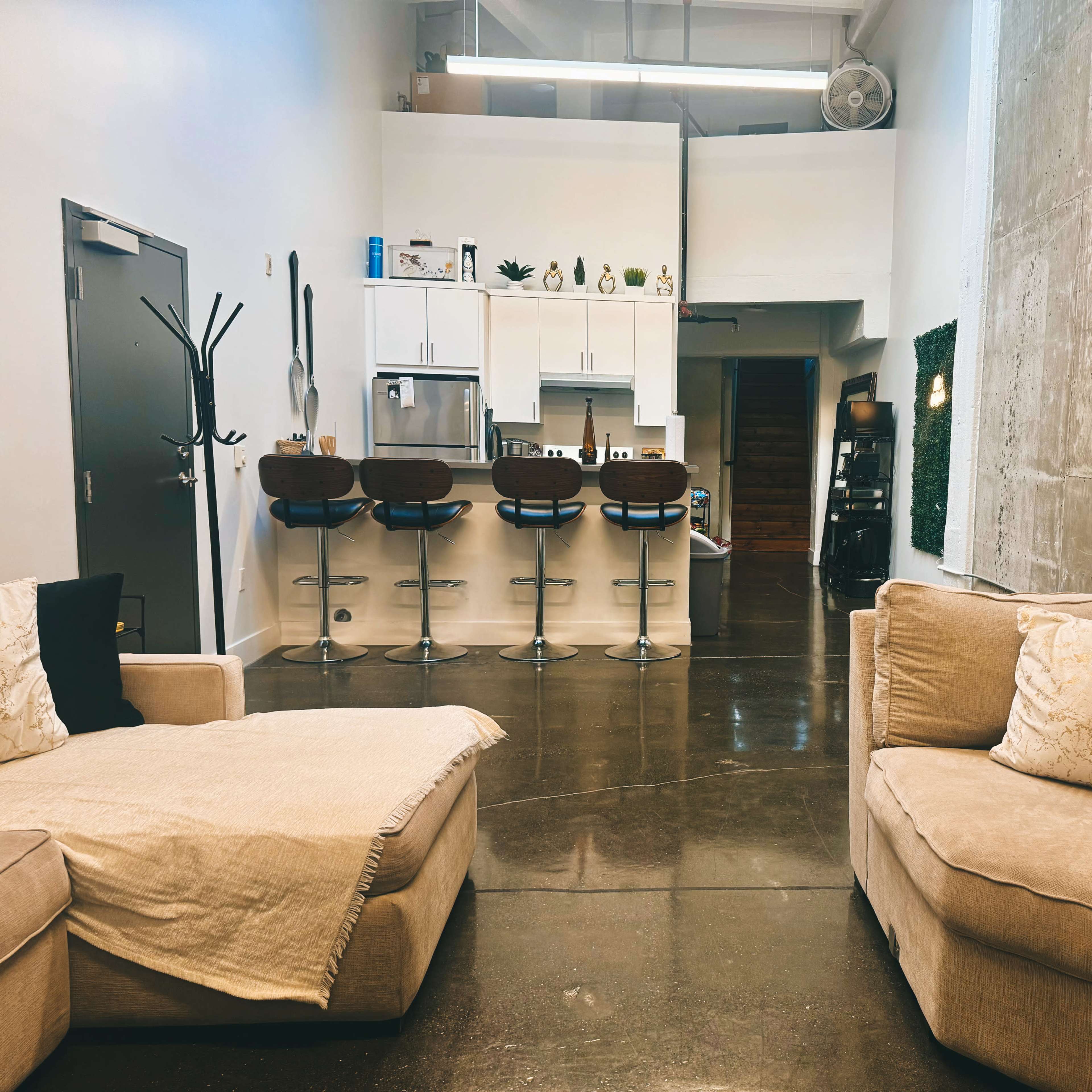 "Host your next event in our modern, spacious concrete loft! This fully furnished space offers a unique backdrops, plenty of room for creativity, and the amenities you need for a successful gathering. Perfect for meetings, workshops, or celebrations. Book your event today!” Image in Coliseum Industrial, Oakland, CA